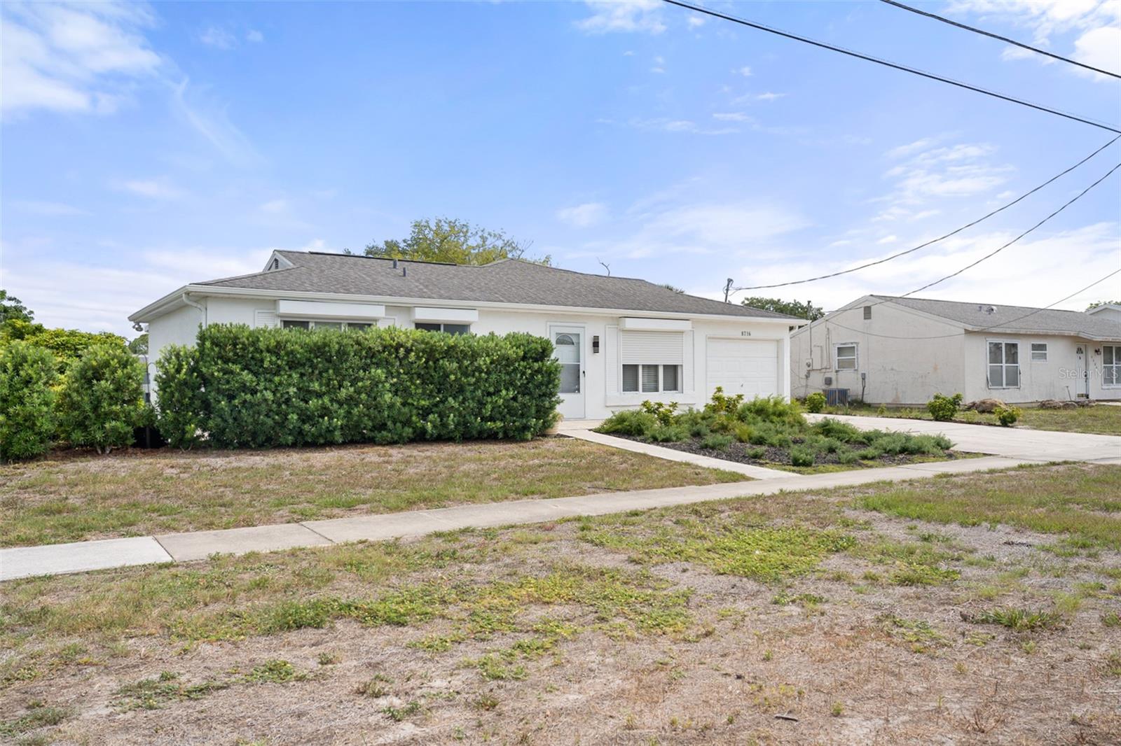 8716 TRIONFO AVE — photo 3