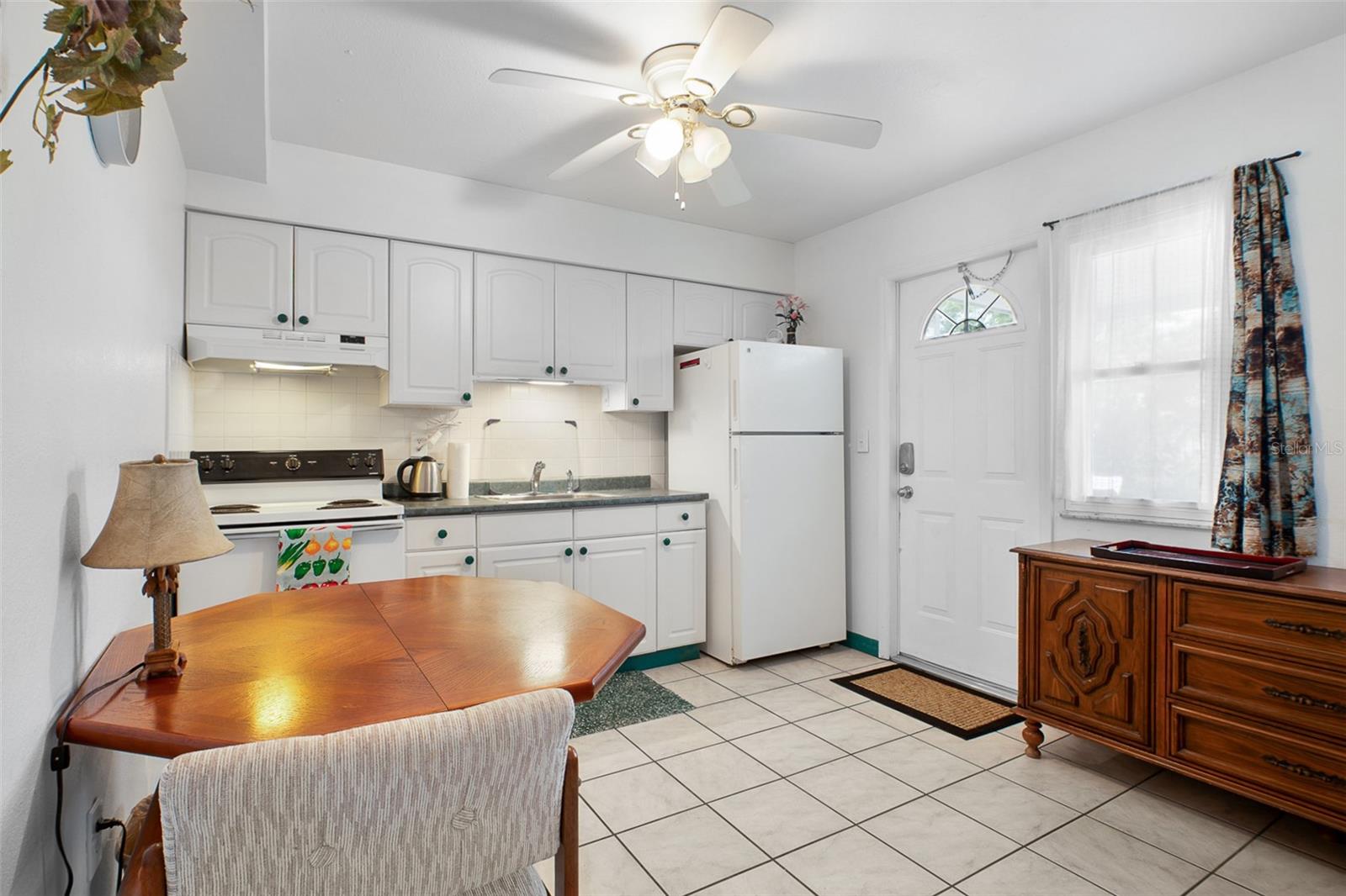 8716 TRIONFO AVE — photo 25