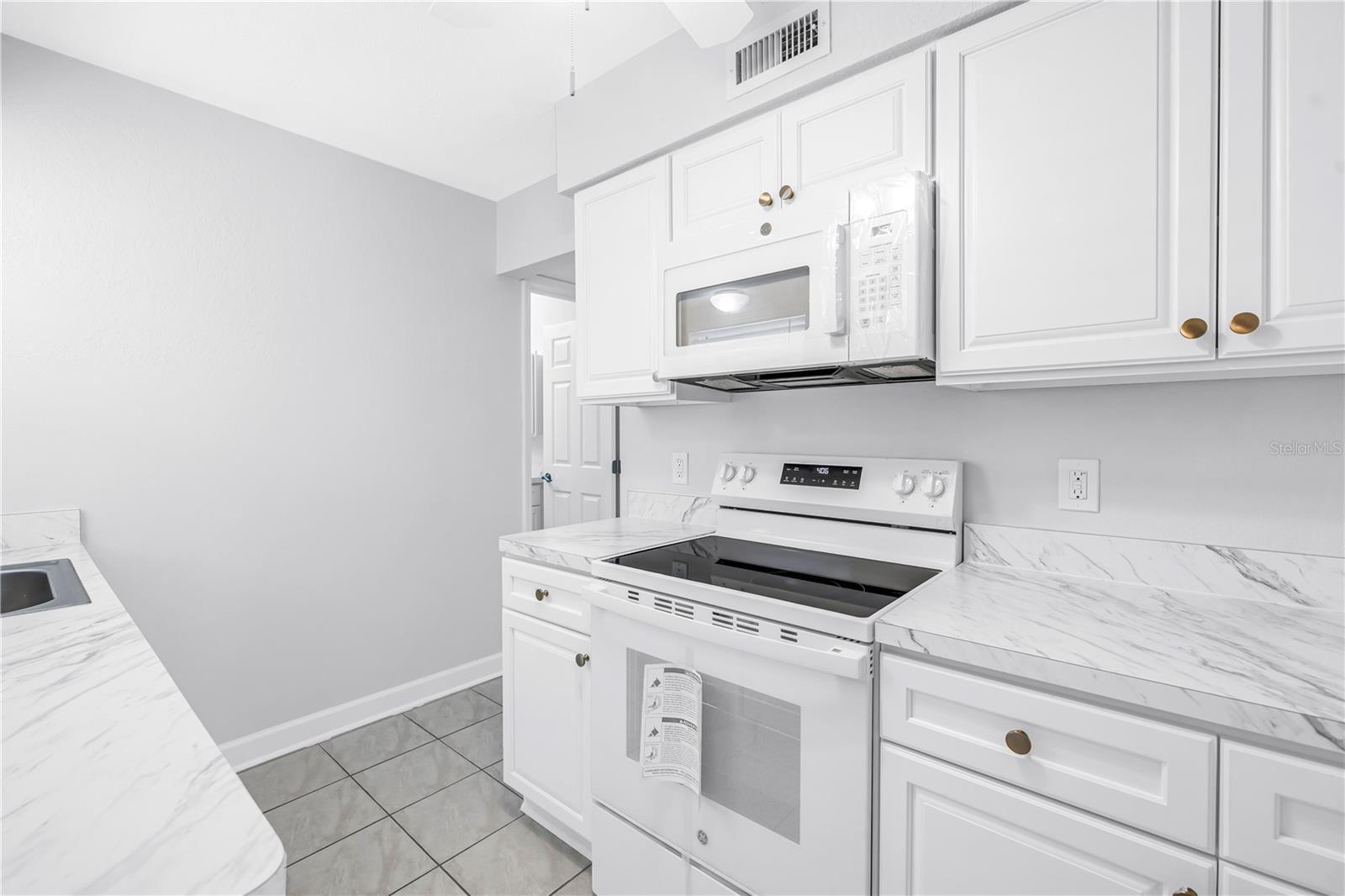 6960 SUNSET DR S #1A — photo 15