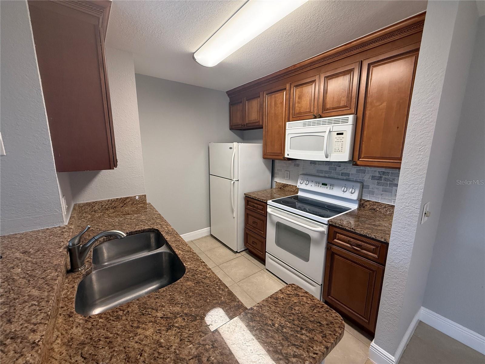 8932 MANOR LOOP #205 — photo 14