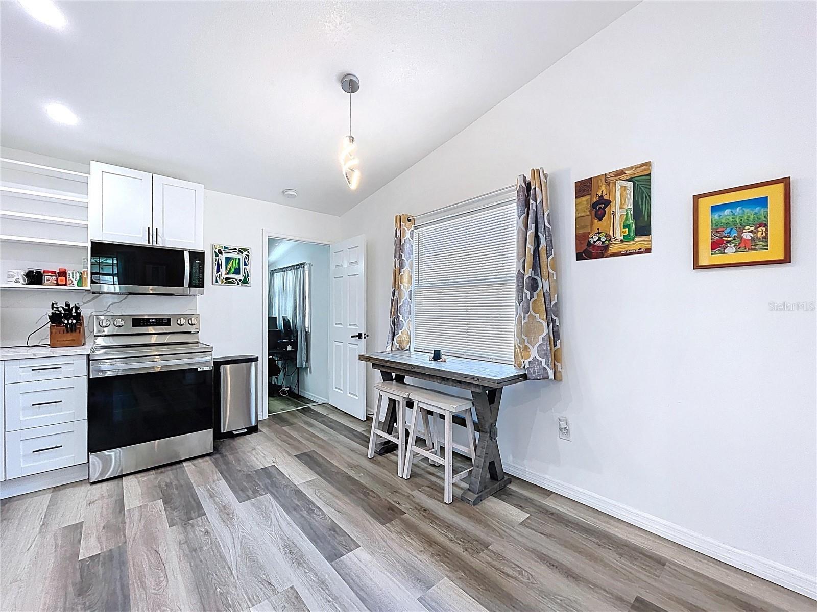 7110 S MASCOTTE ST — photo 18