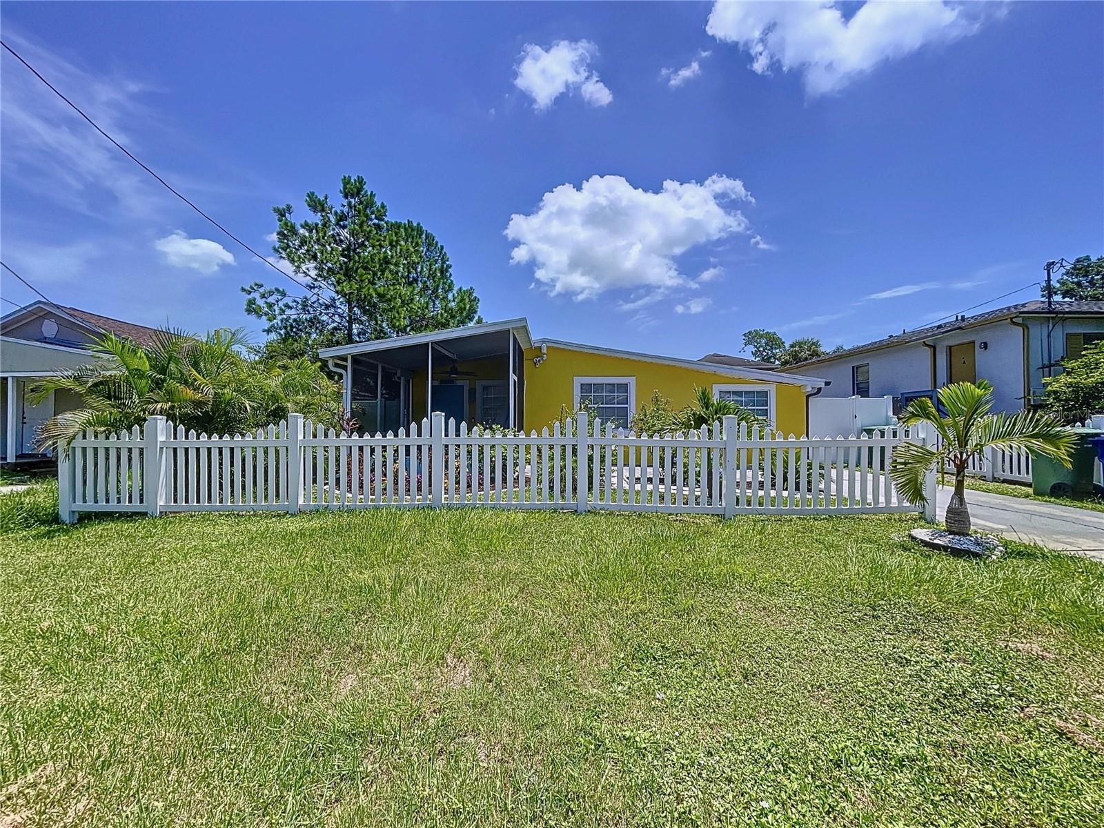 7110 S MASCOTTE ST — photo 2