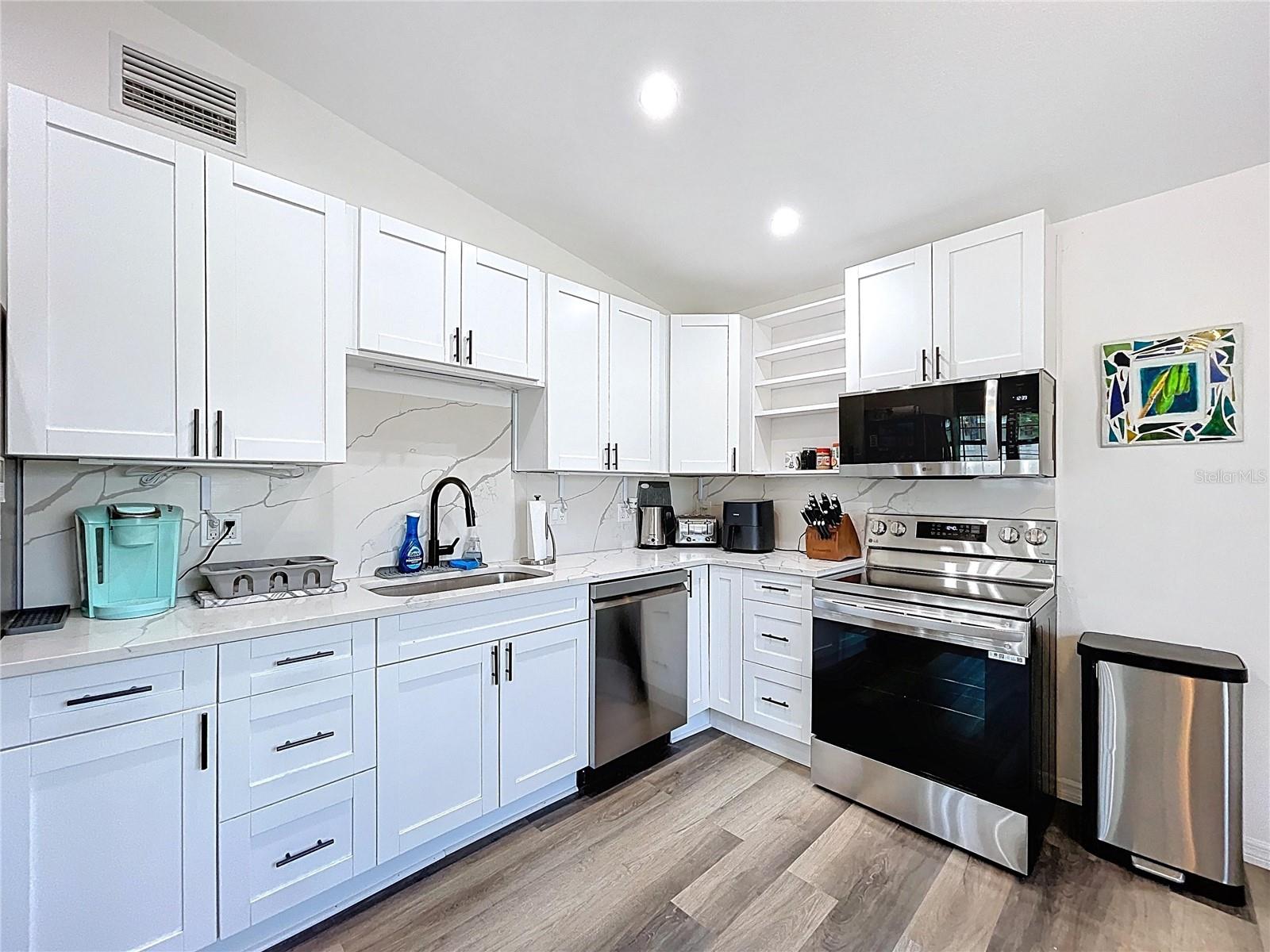7110 S MASCOTTE ST — photo 16