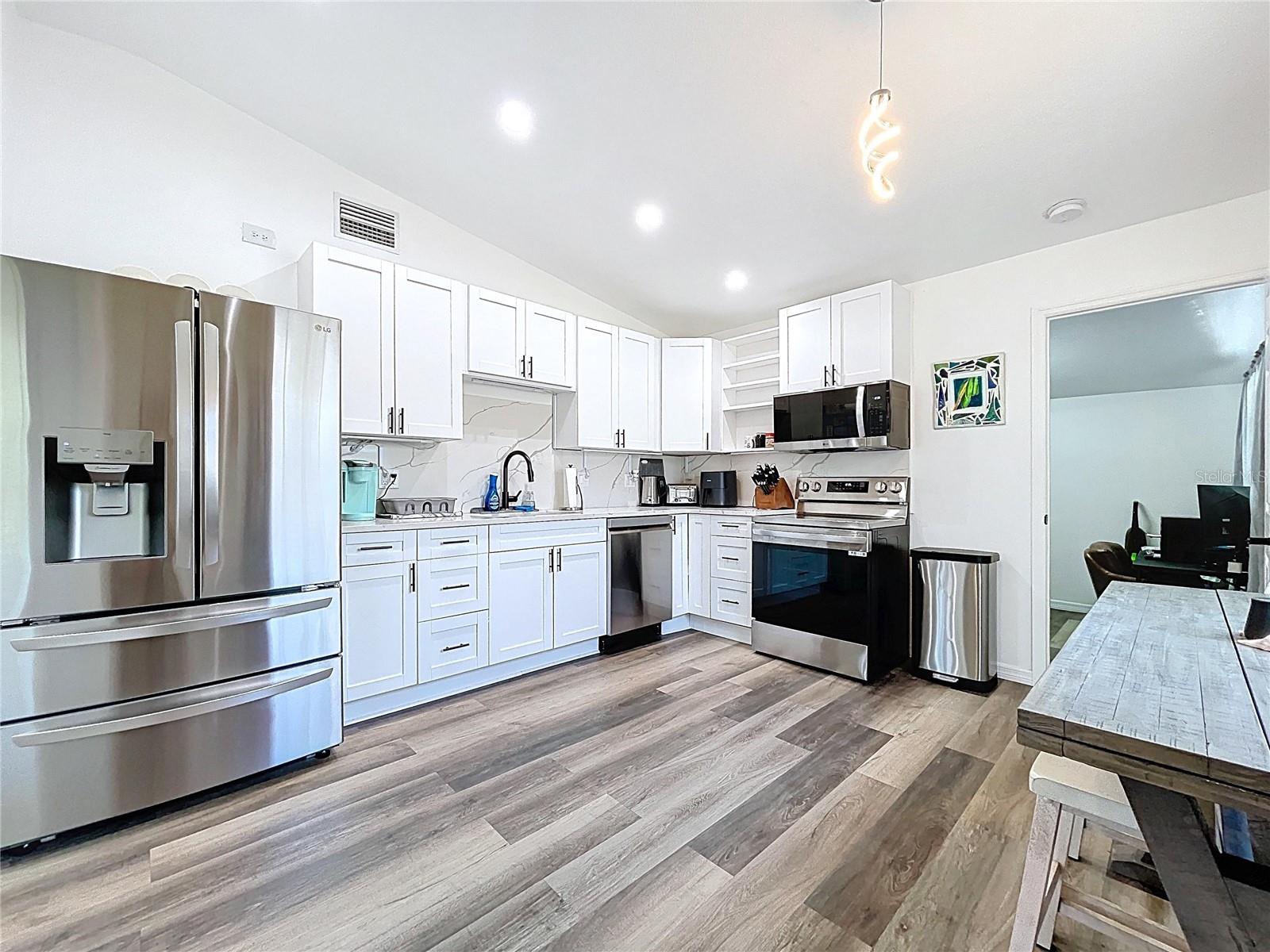 7110 S MASCOTTE ST — photo 15