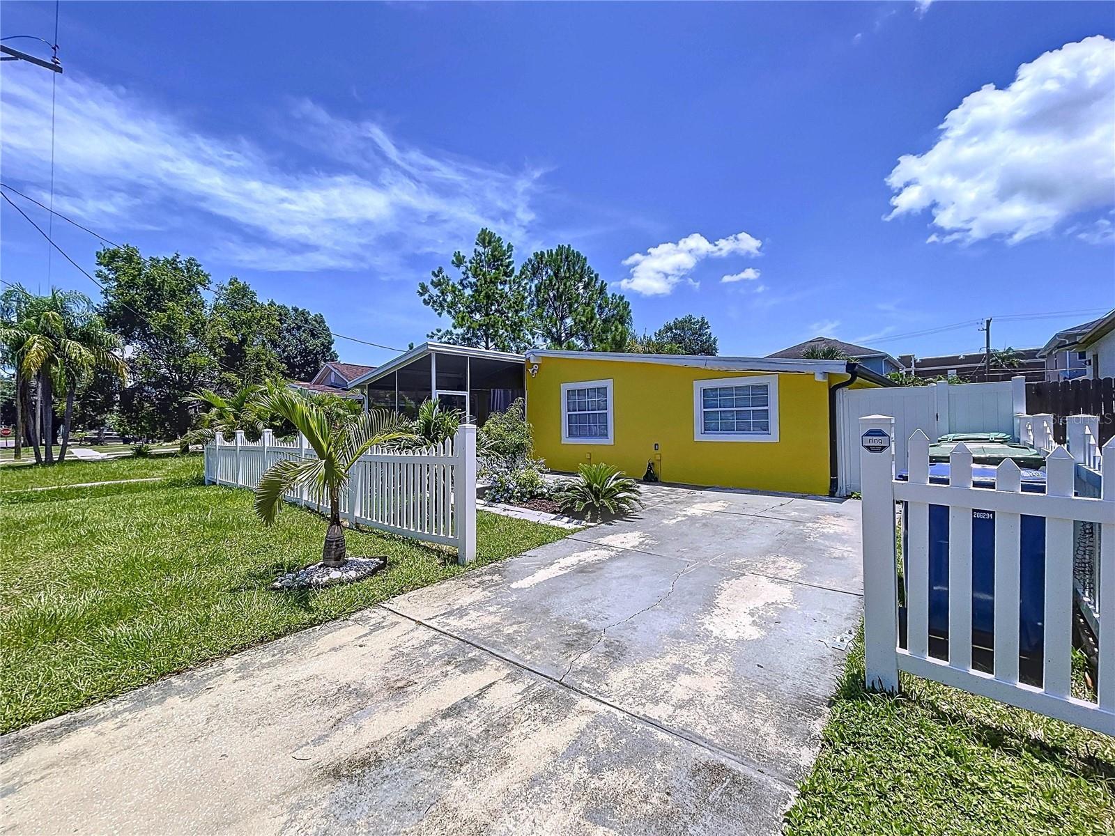 7110 S MASCOTTE ST — photo 4