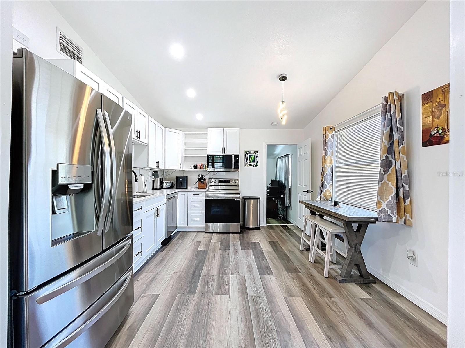 7110 S MASCOTTE ST — photo 19