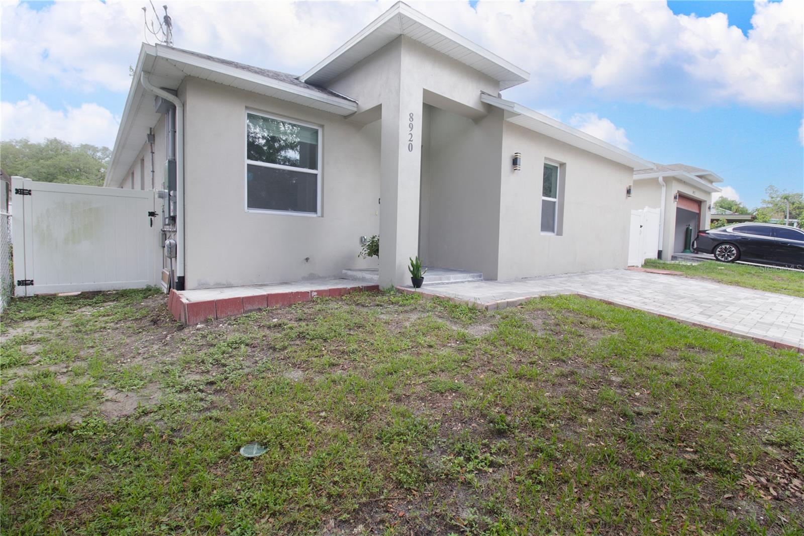 8920 N NEWPORT AVE — photo 3