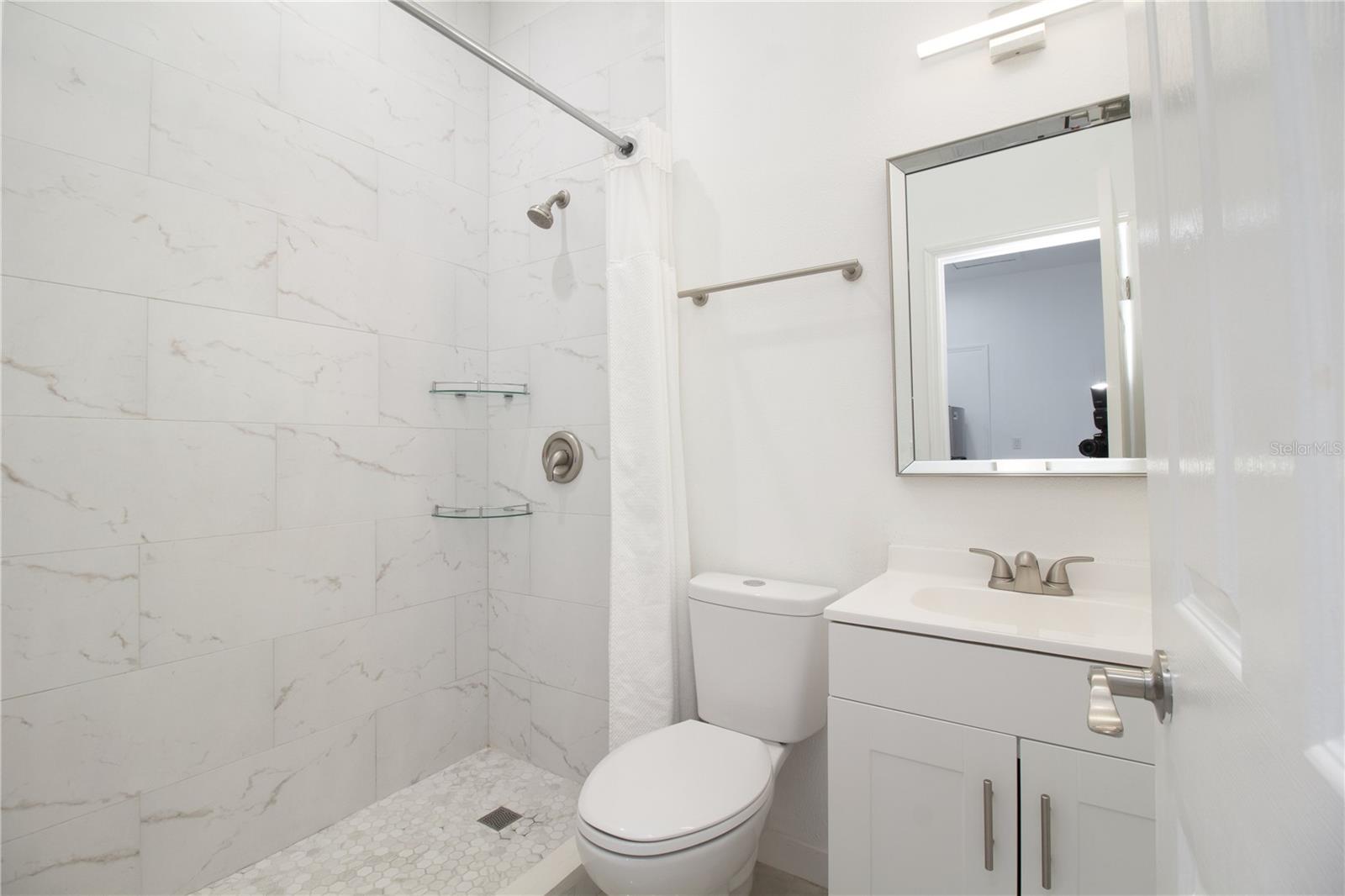 8920 N NEWPORT AVE — photo 25