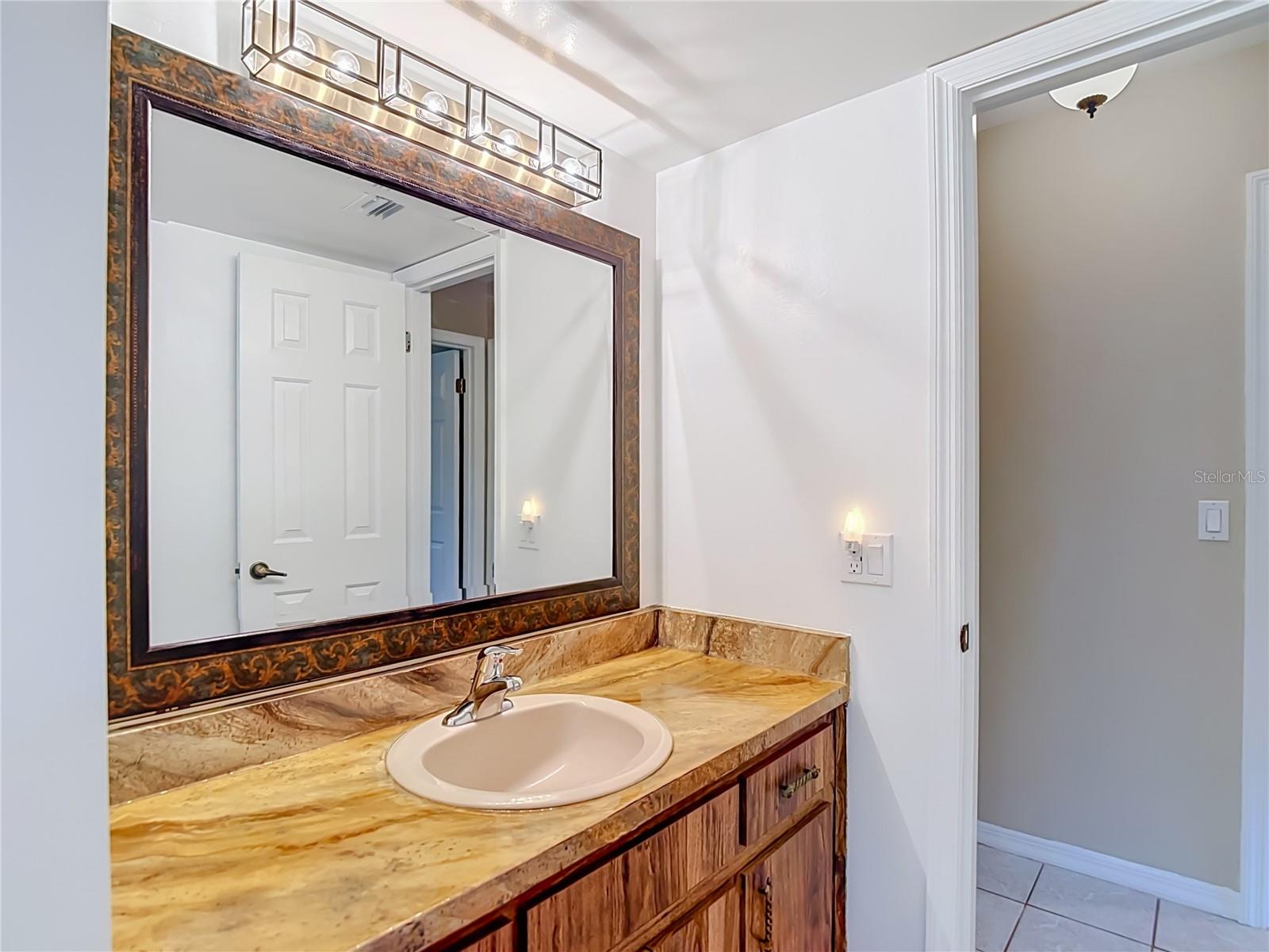12721 N ARMENIA AVE — photo 42