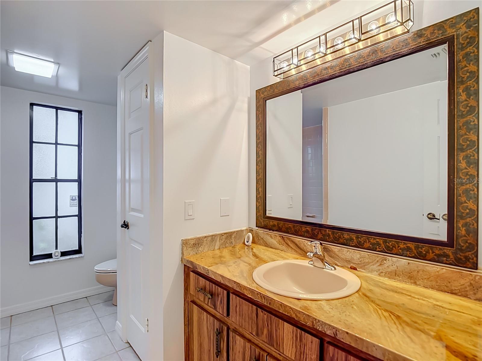 12721 N ARMENIA AVE — photo 41