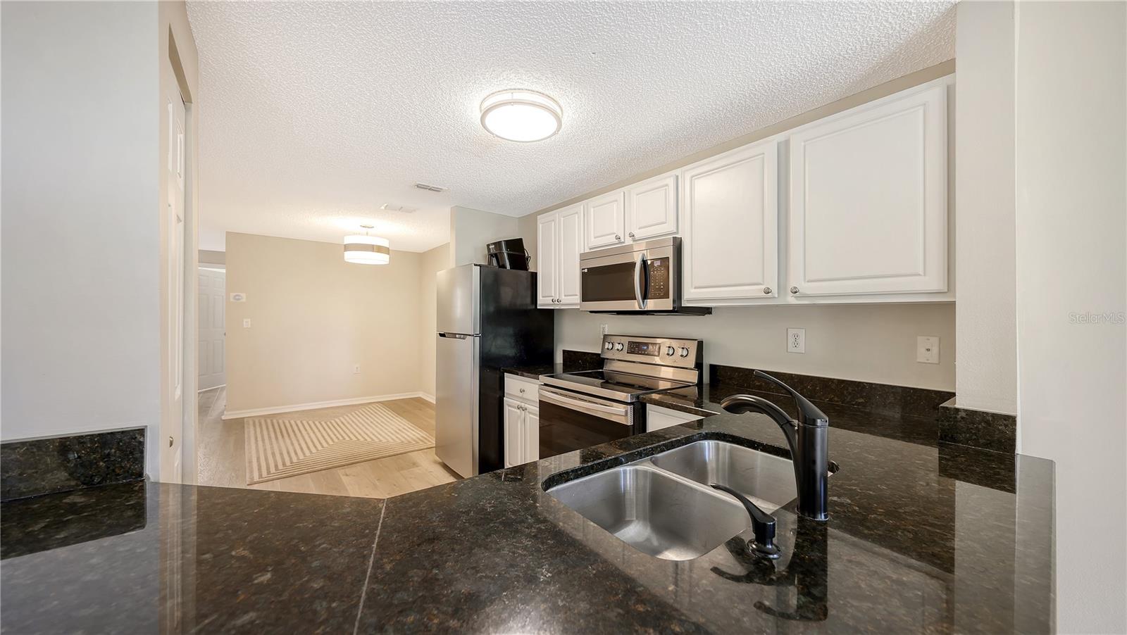 5551 BENTGRASS DR #11-117 — photo 8