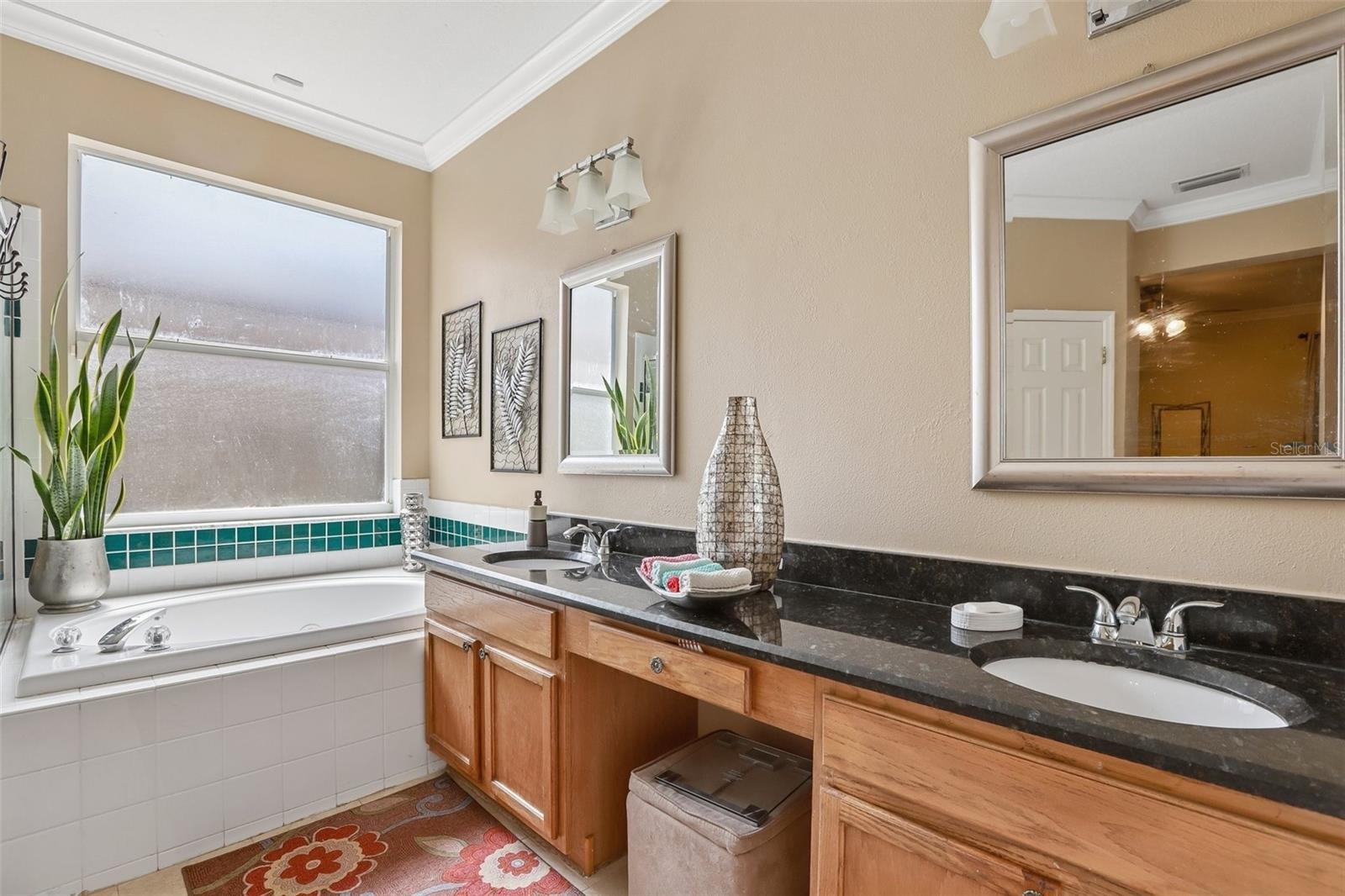 4761 WHISPERING WIND AVE — photo 21