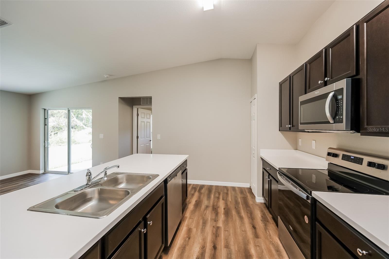 4458 WINDSONG AVE — photo 7