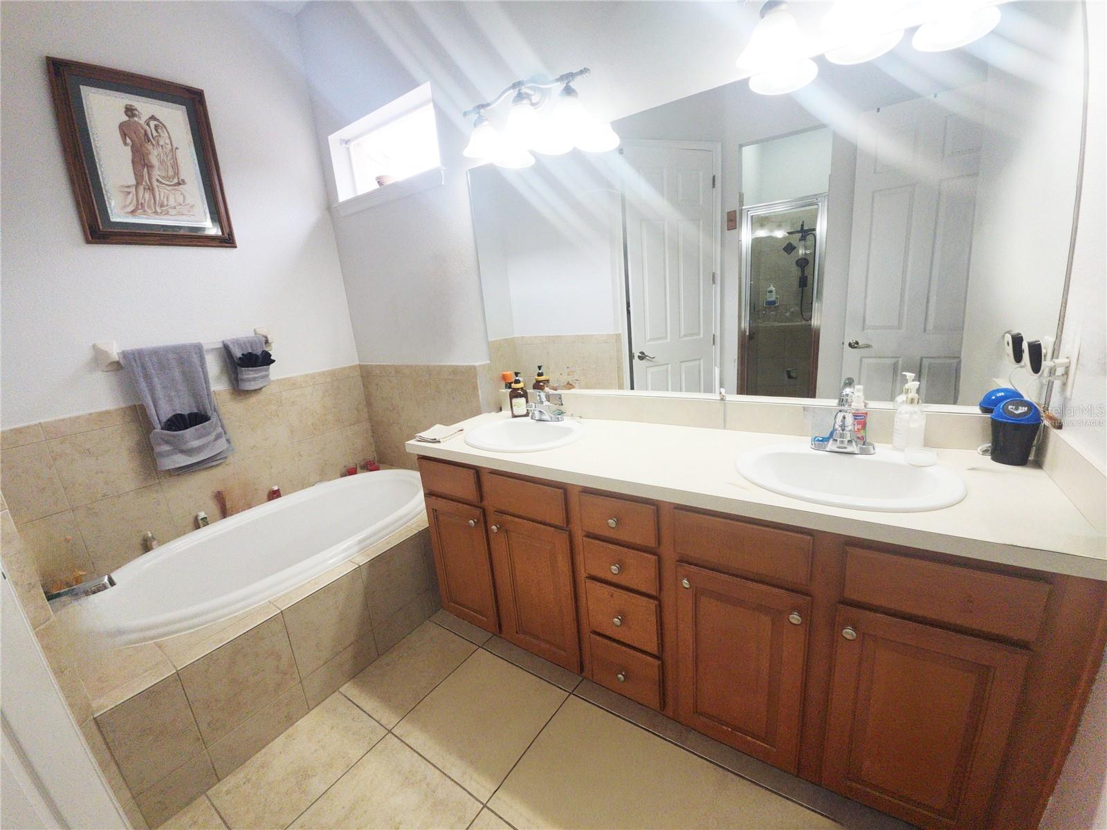 8604 TIDAL BREEZE DR — photo 34