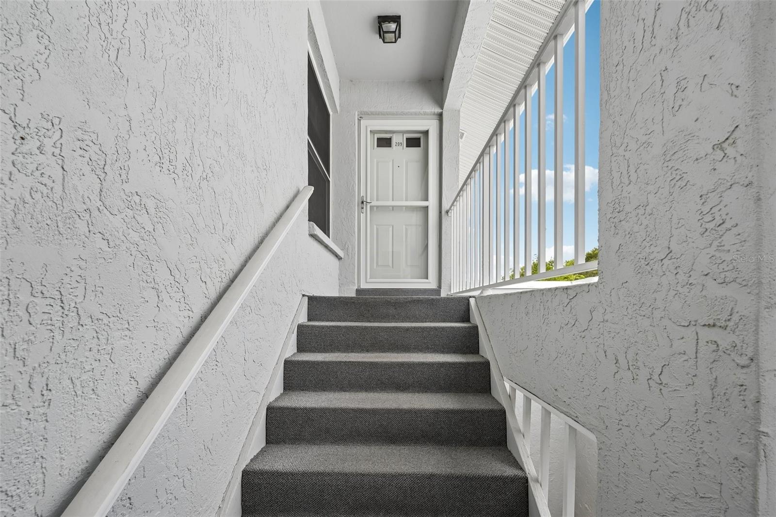 1041 CAPRI ISLES BLVD #209 — photo 2