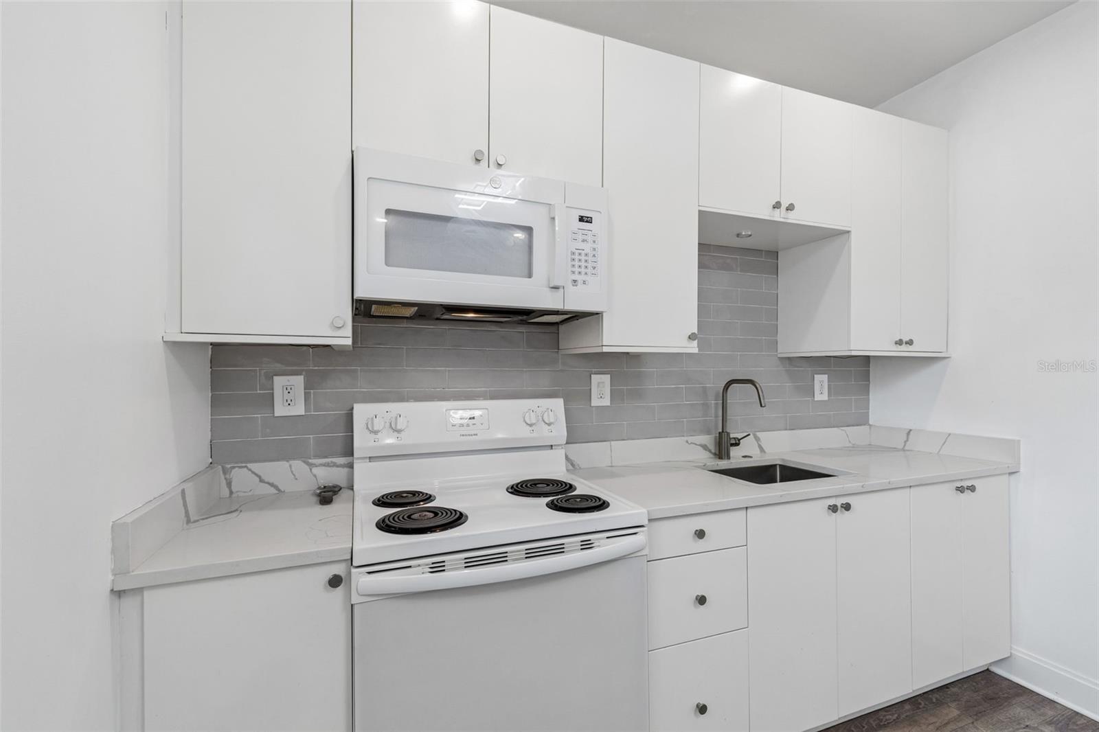 1406 E 23RD AVE — photo 8