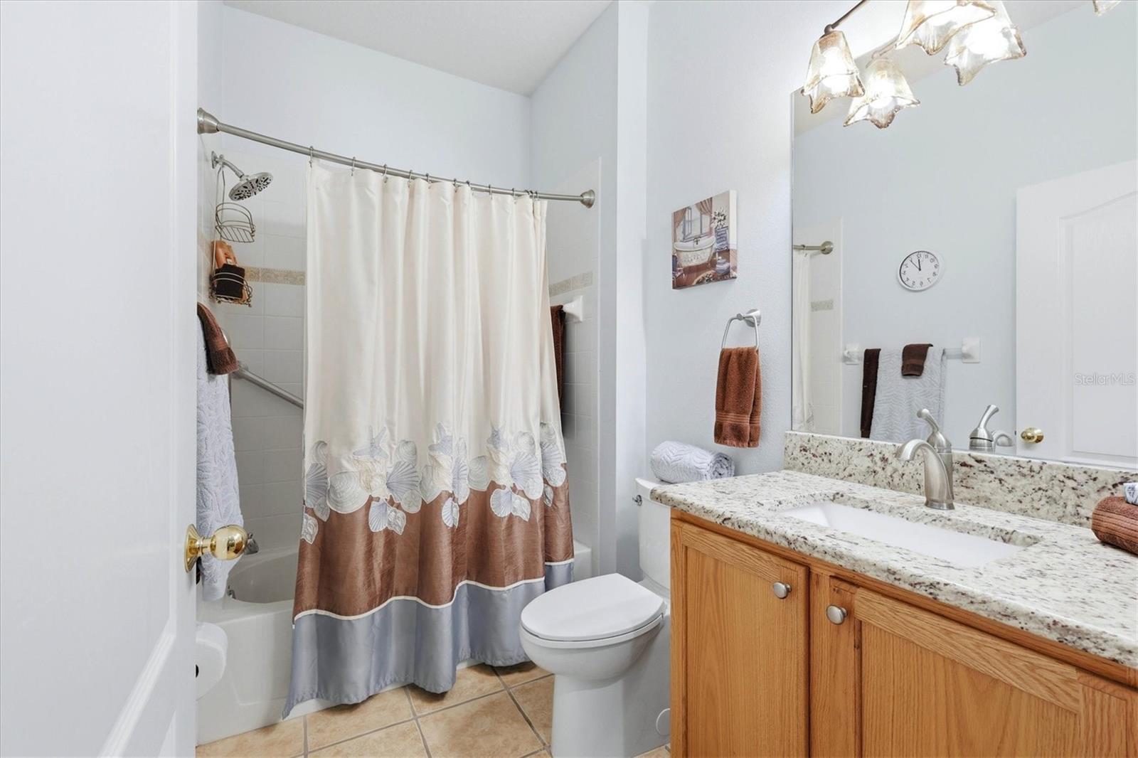 4939 WHISPERING OAKS DR — photo 28