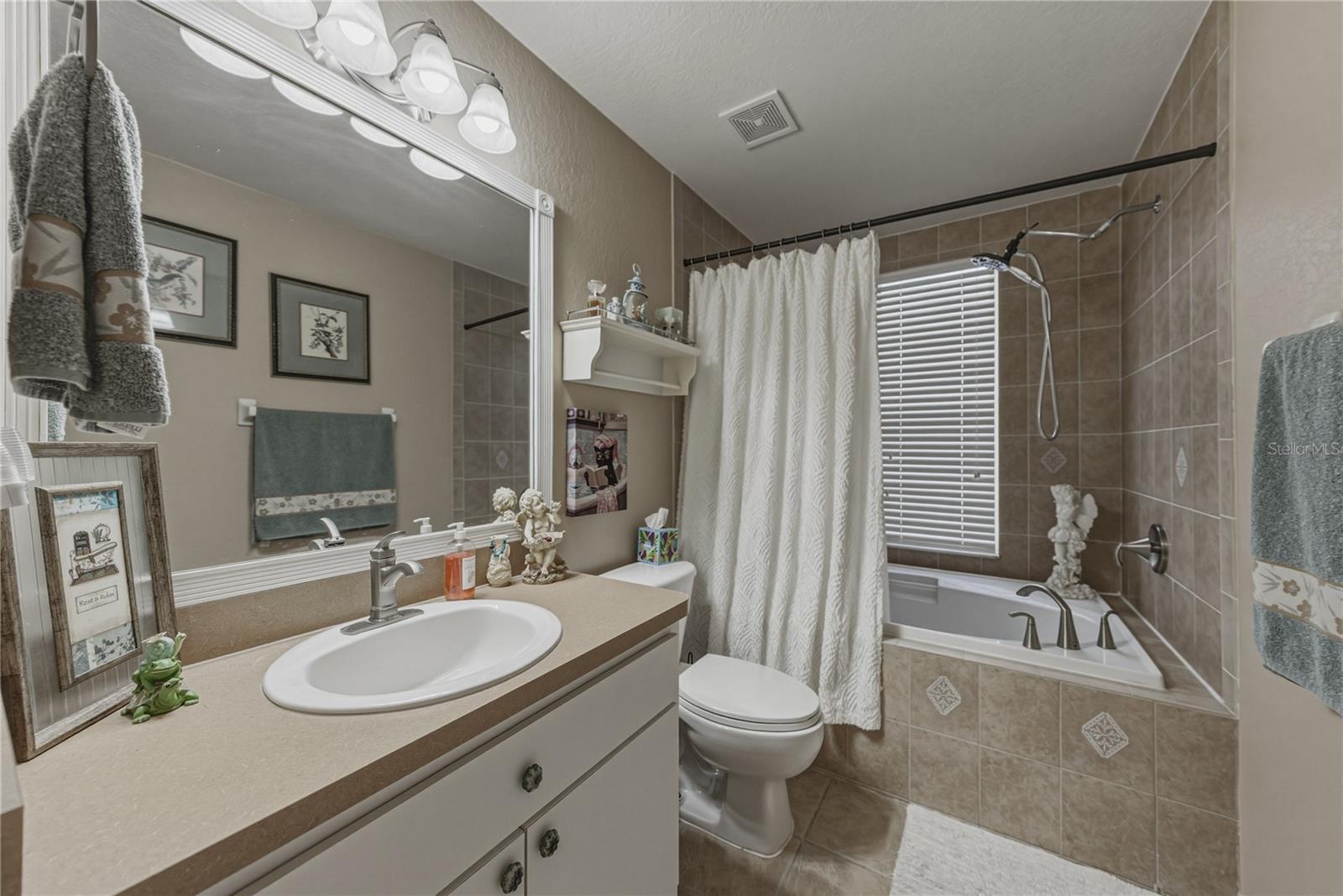 12215 WOODLANDS CIR — photo 39