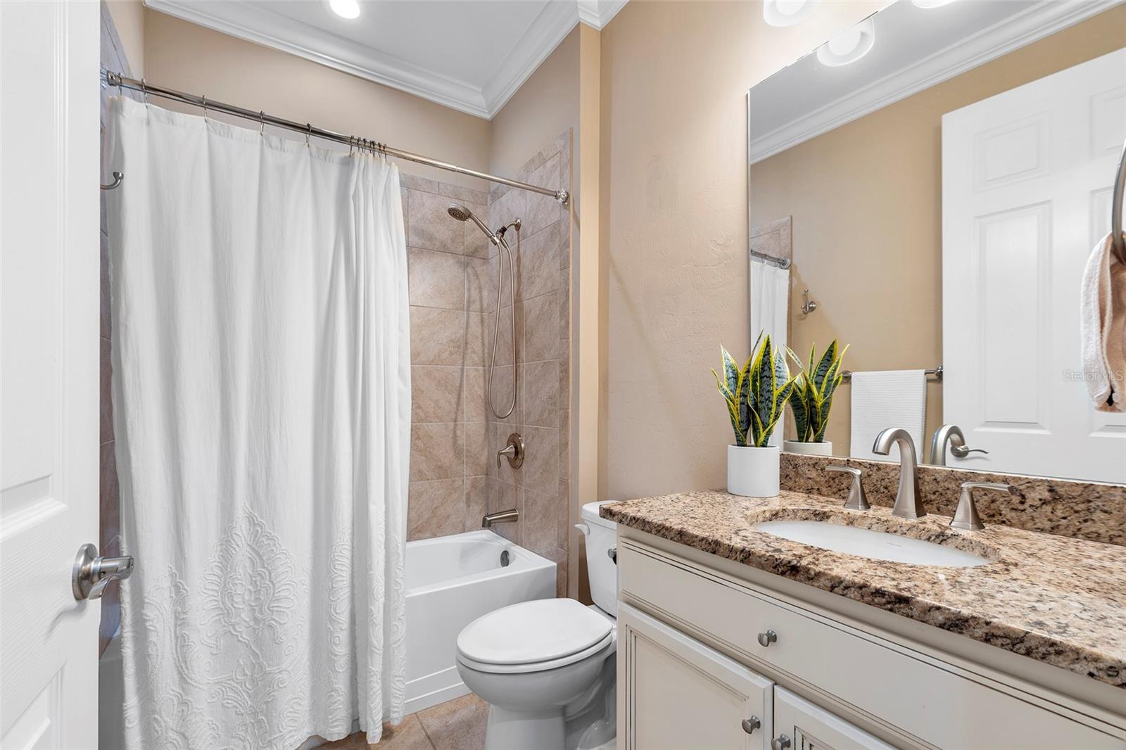1015 BLUFFWOOD DR — photo 26
