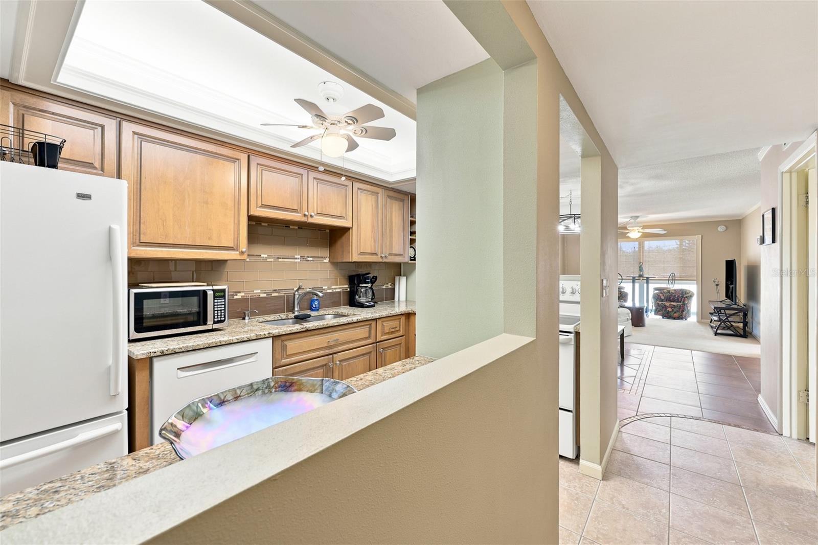 1 BOCA CIEGA POINT BLVD #316 — photo 10