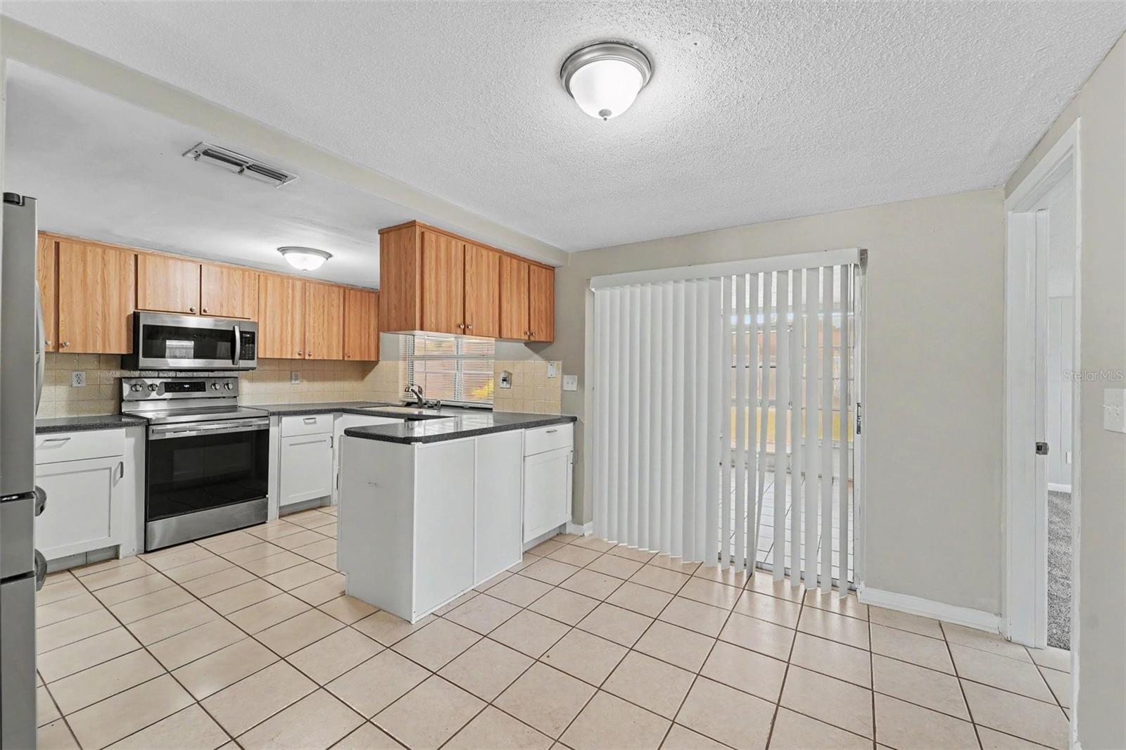 7006 MAPLEHURST DR — photo 10