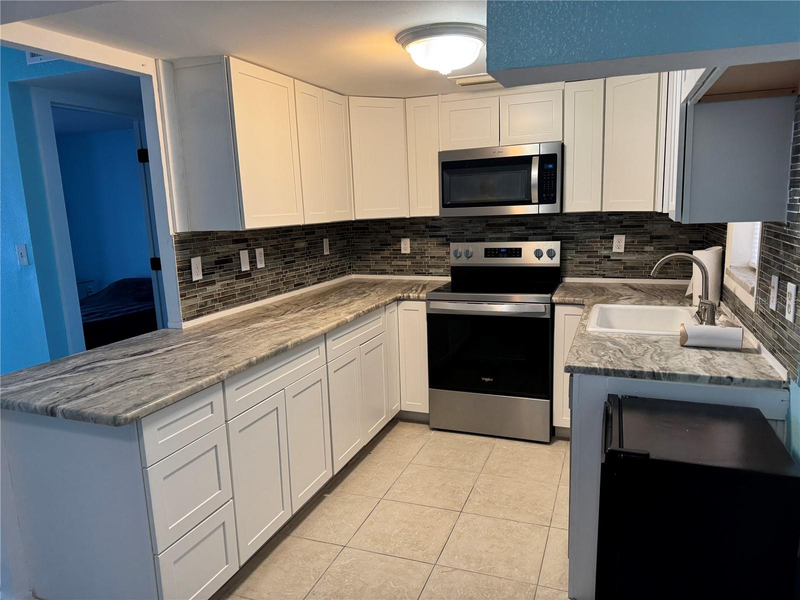 4515` MARINE PKWY #102 — photo 4