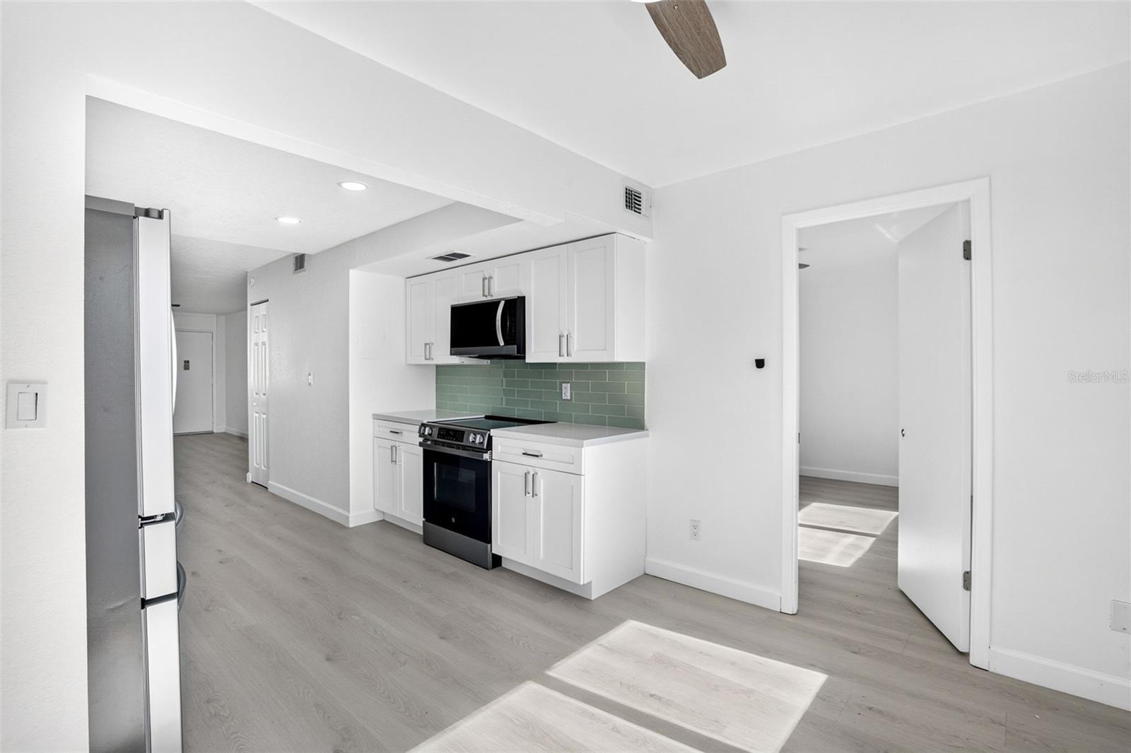 5095 BAY ST NE #310 — photo 13