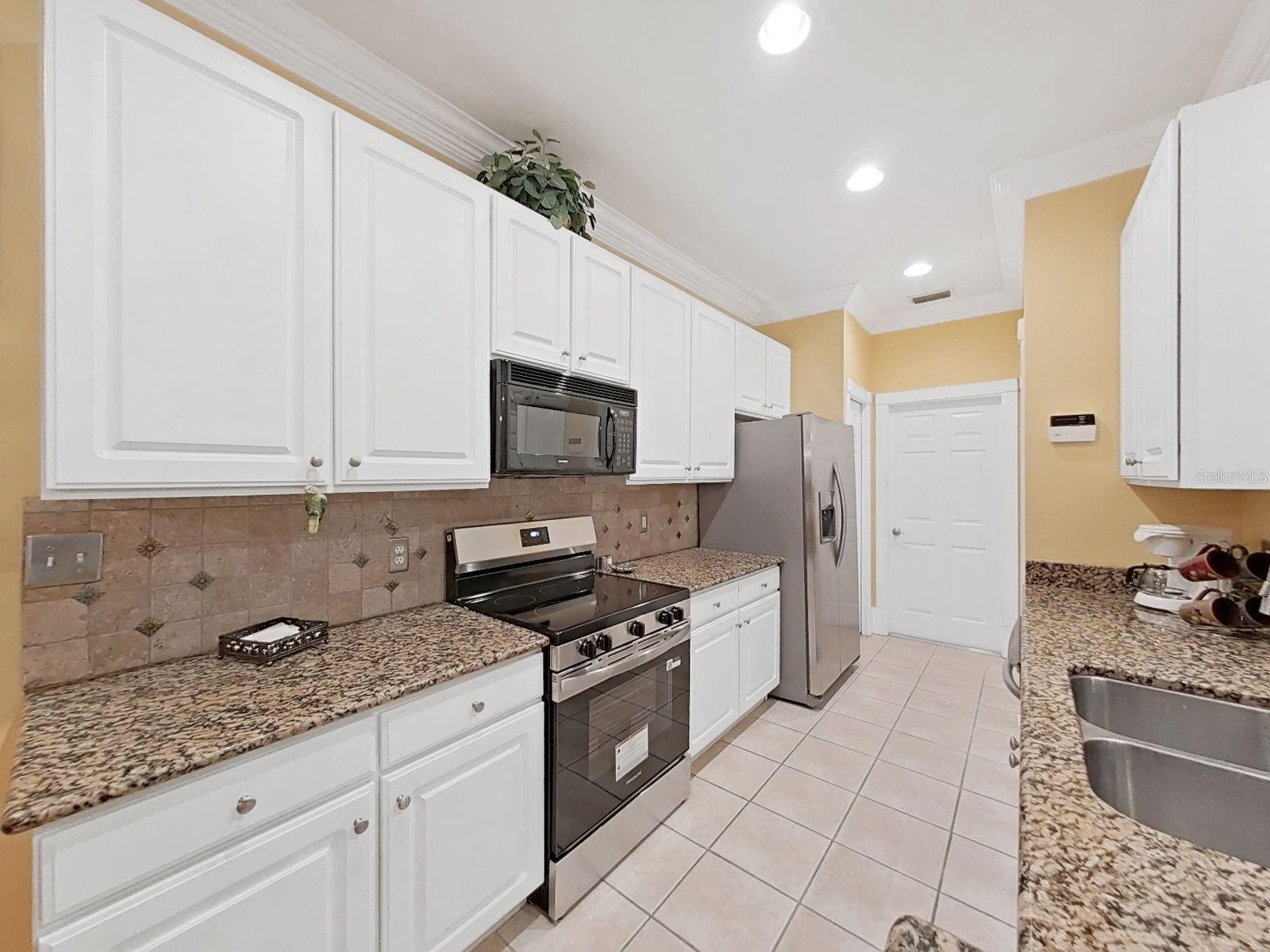 8609 ALEXANDRA ARBOR LN — photo 25