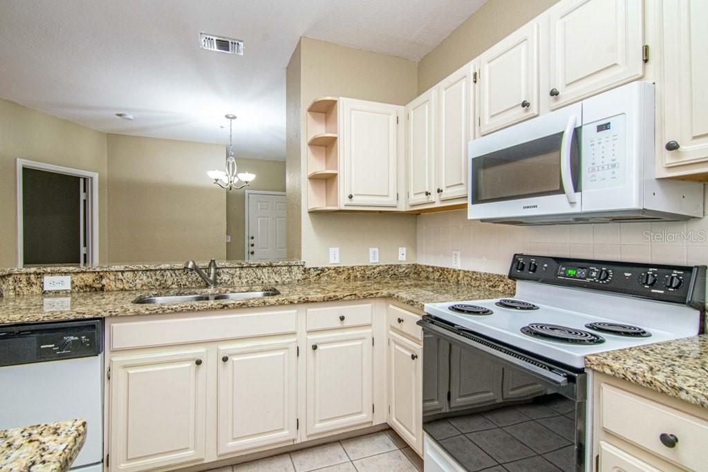 5713 LEGACY CRESCENT PL #101 — photo 12