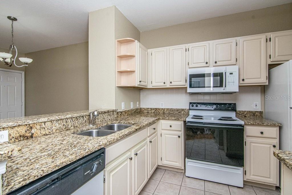 5713 LEGACY CRESCENT PL #101 — photo 11