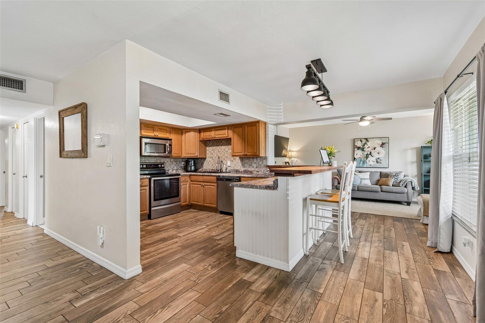 10748 VILLAGE GREEN AVE — photo 5