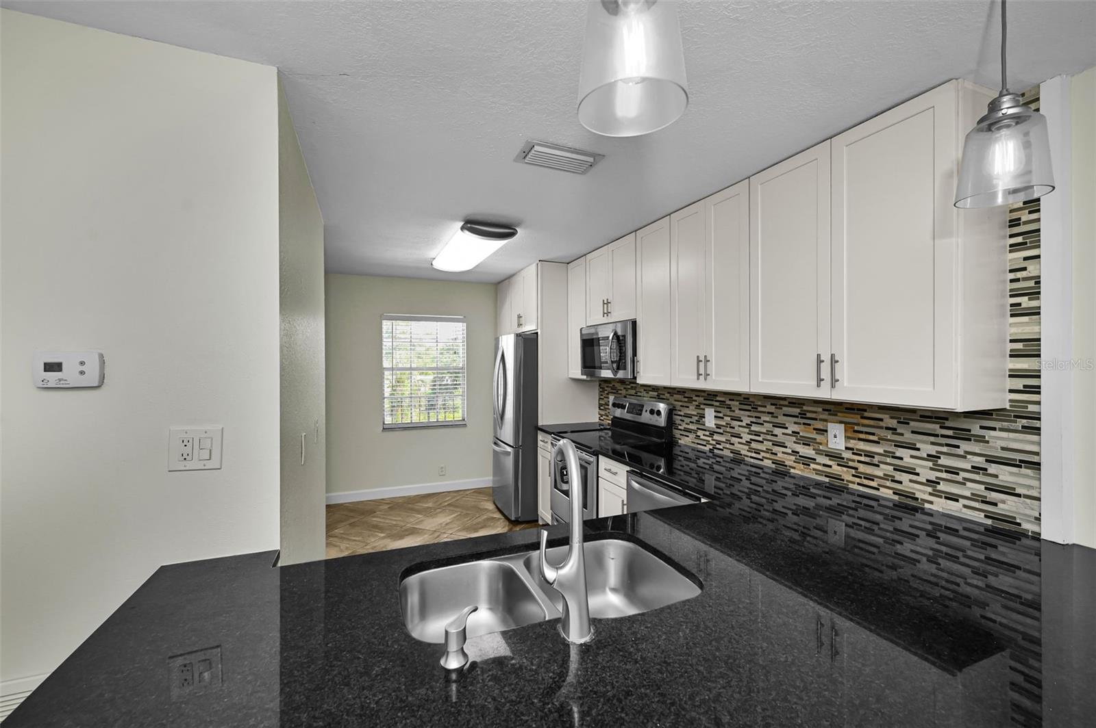8765 BARDMOOR BLVD #306 — photo 13