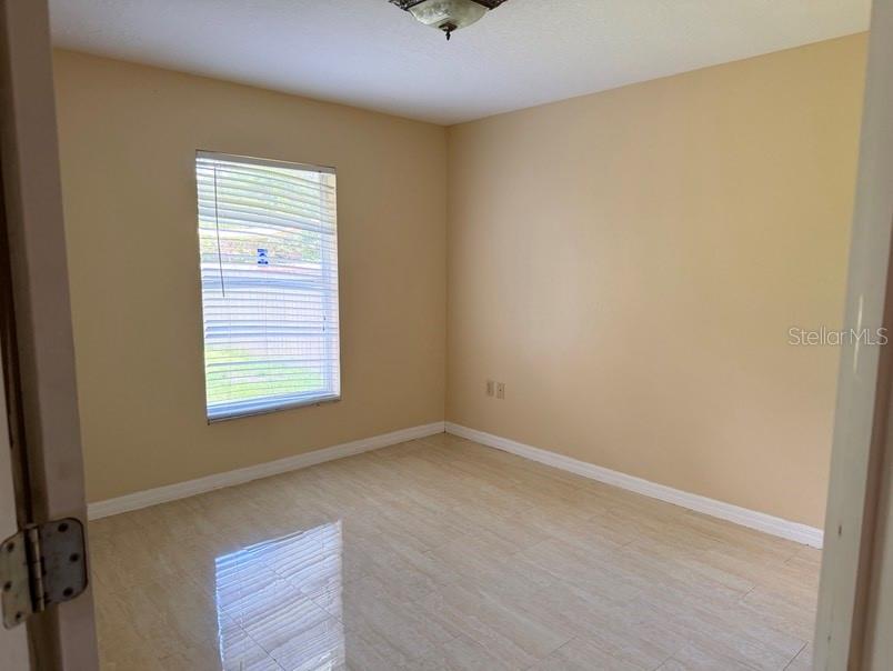 12721 N OLA AVE — photo 15