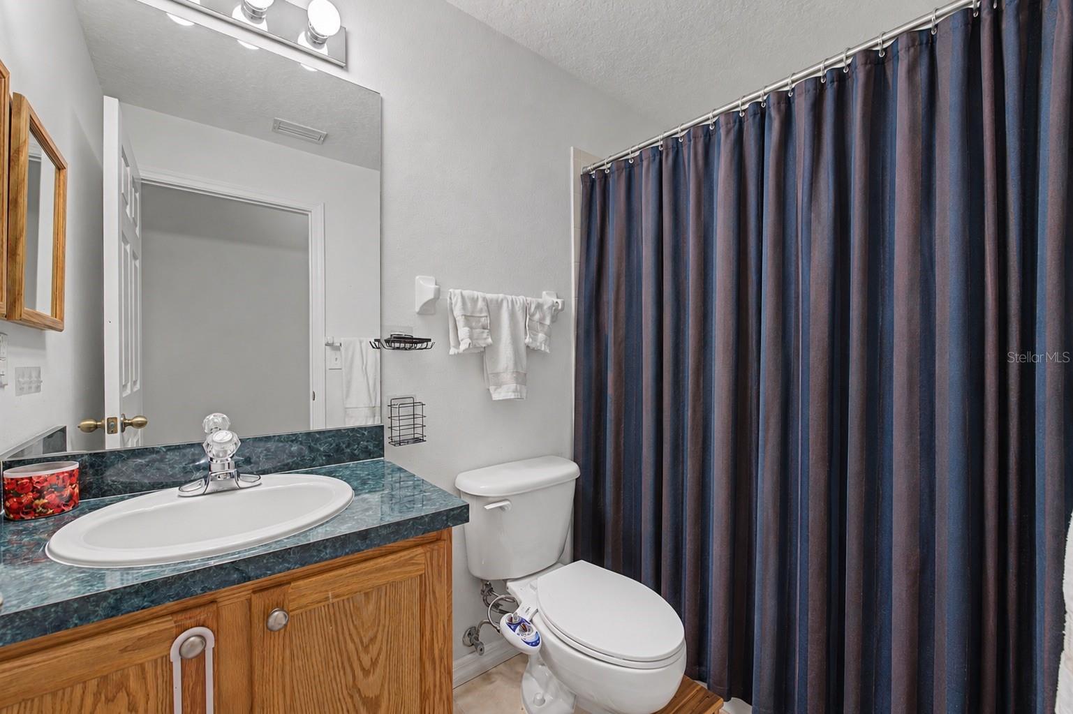 4756 WHISPERING WIND AVE — photo 31