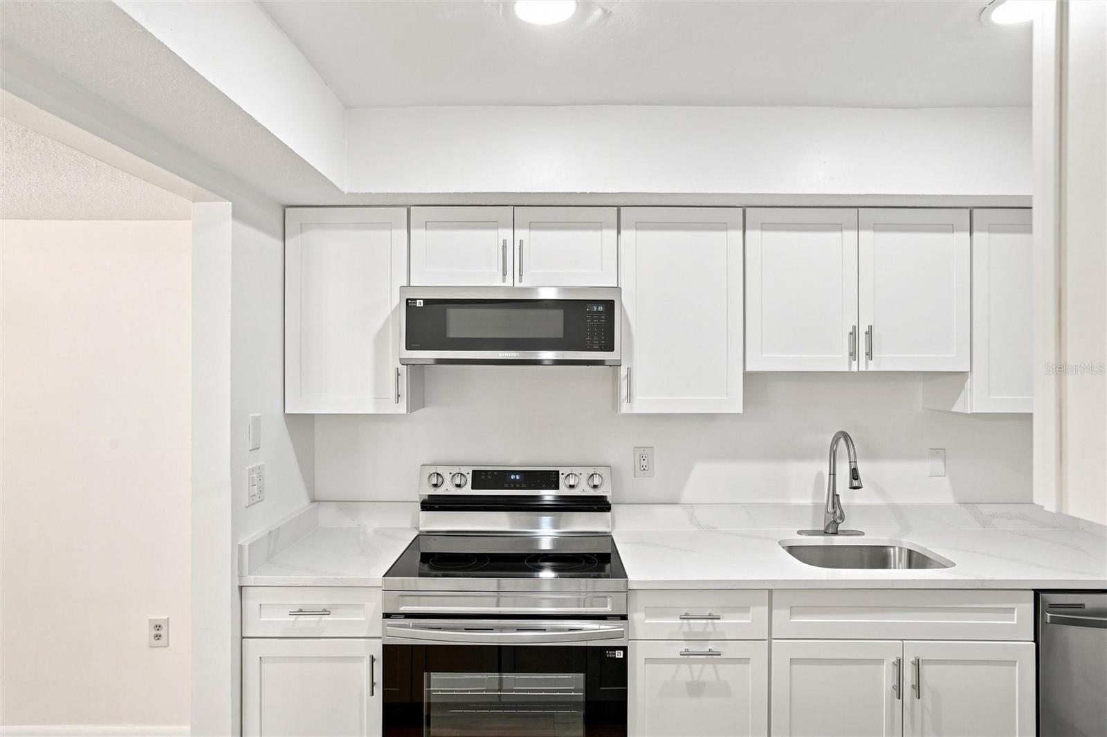 6947 WOODWIND DR #77 — photo 8