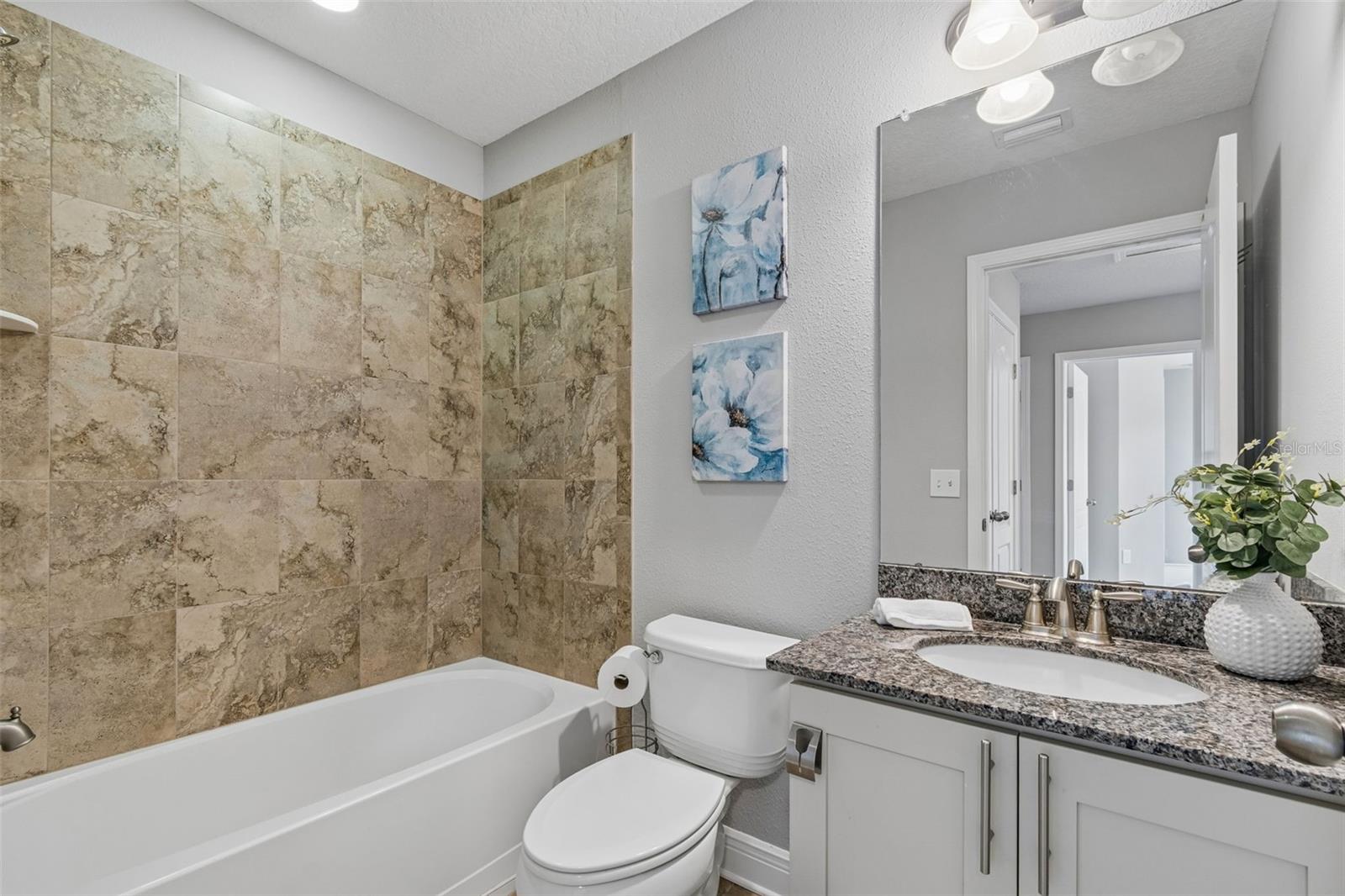 1216 E GIDDENS AVE — photo 50