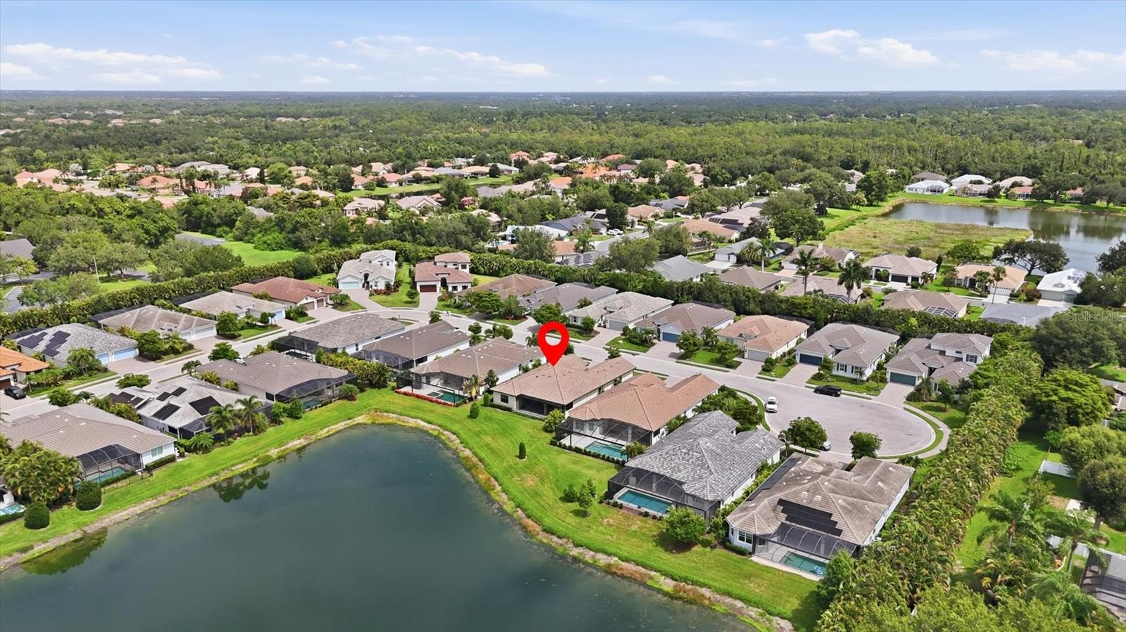 7712 SANDHILL LAKE DR — photo 54