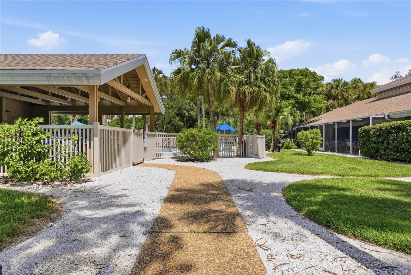5063 VILLAGE GARDENS DR #9 — photo 32