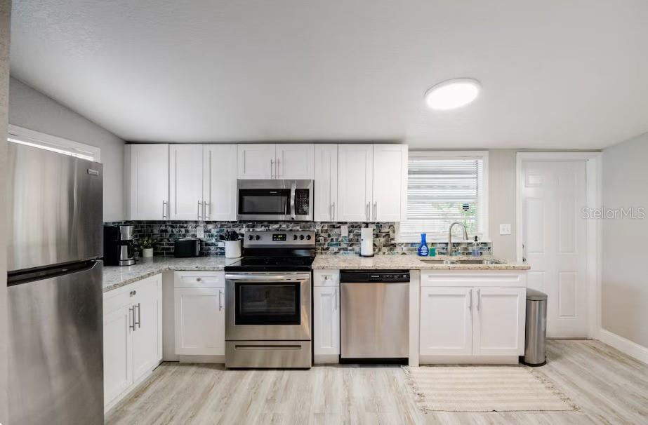 8311 N NEWPORT AVE — photo 5