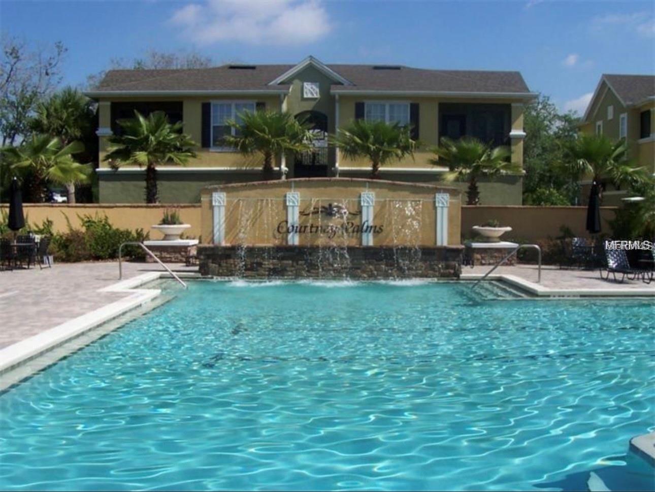 10025 COURTNEY PALMS BLVD #204 — photo 2