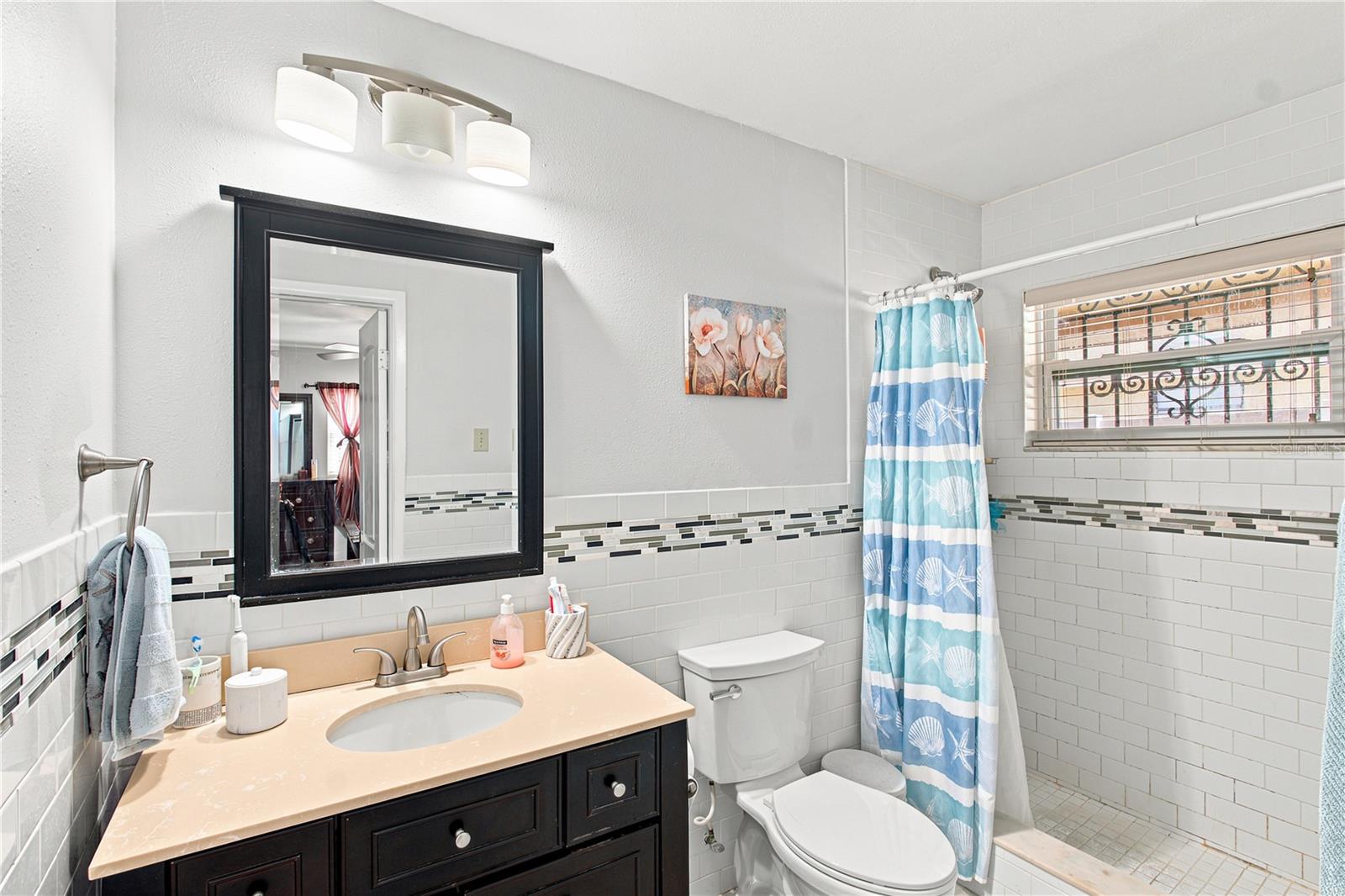 6513 N MANHATTAN AVE — photo 16