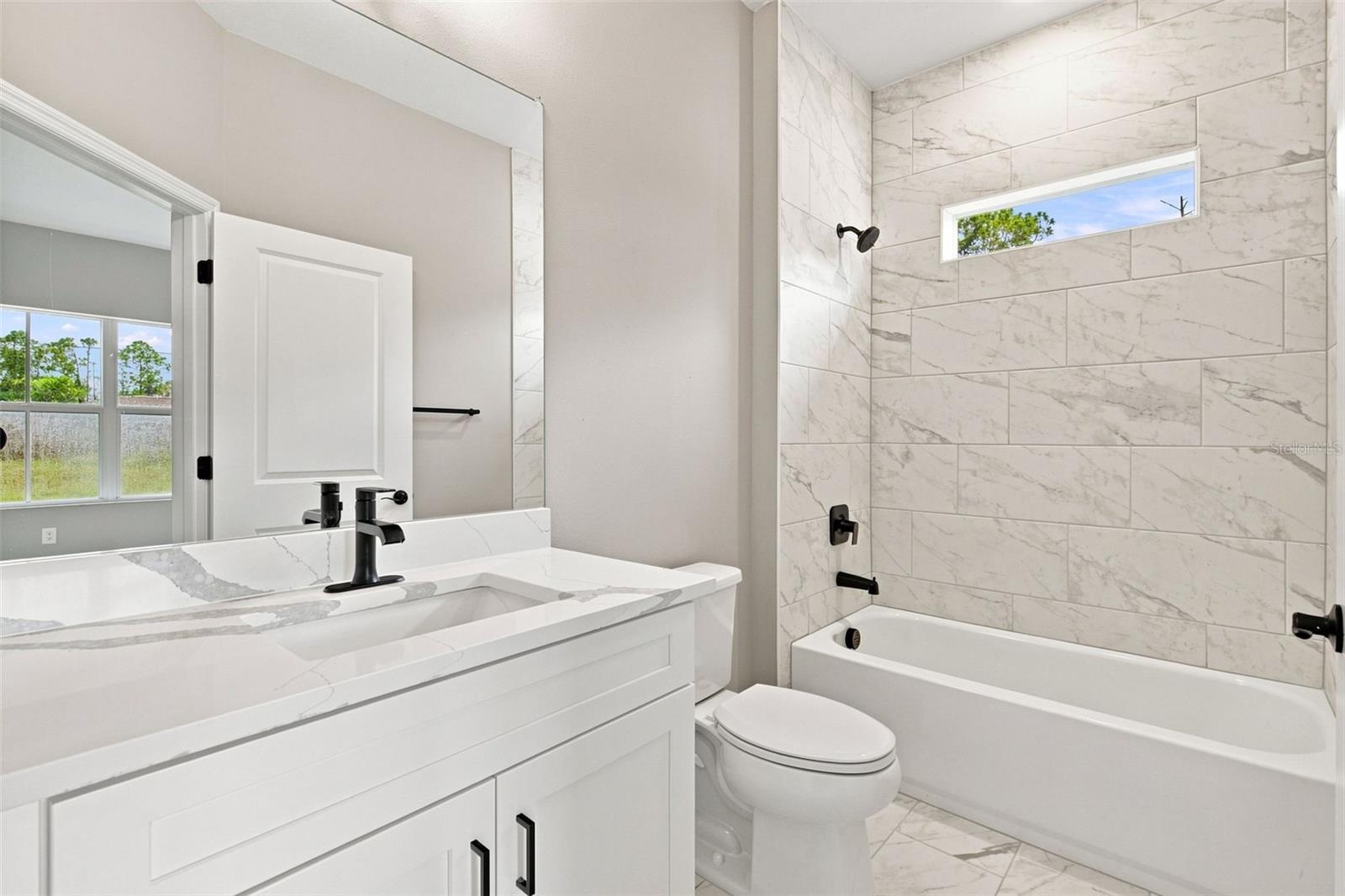 8211 ELKENBERRY AVE — photo 25