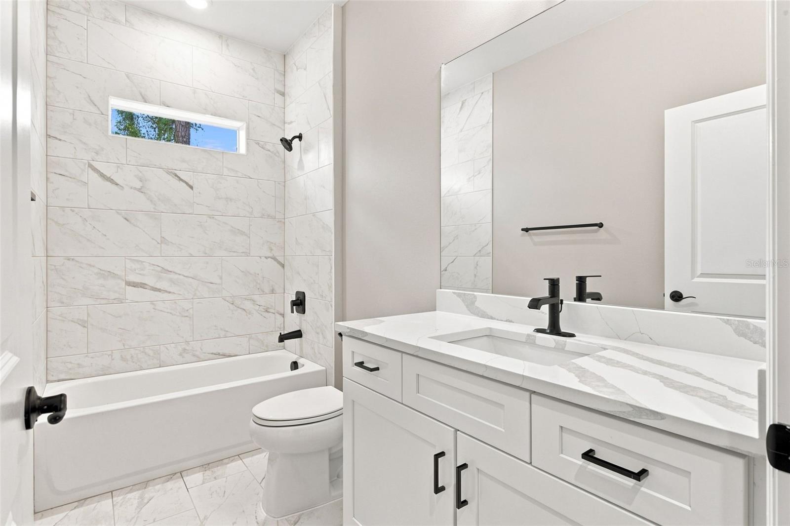 8211 ELKENBERRY AVE — photo 21