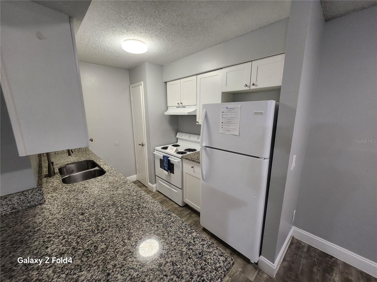 502 GOLDEN RAINTREE PL — photo 9