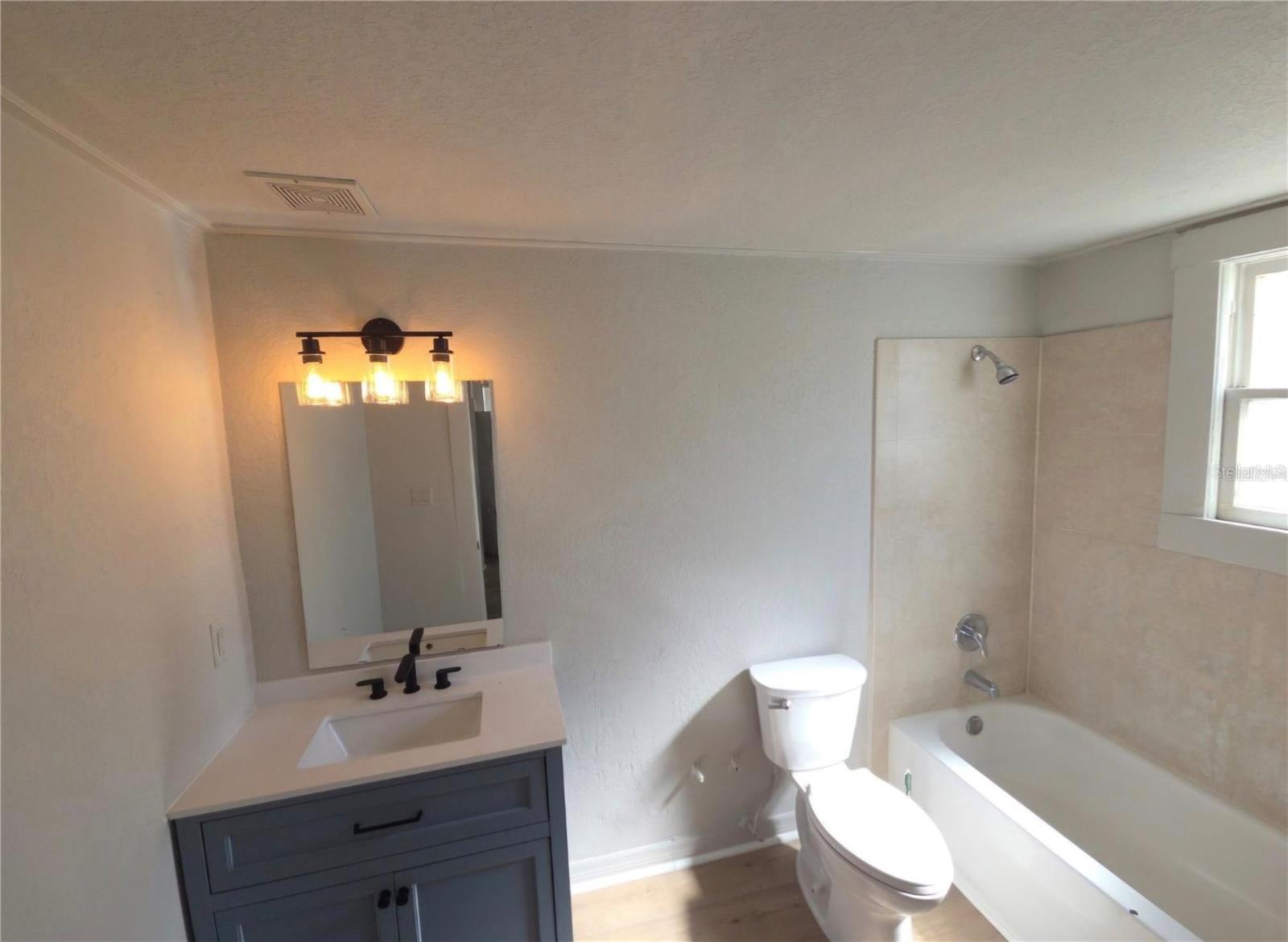 1908 N MITCHELL AVE — photo 11