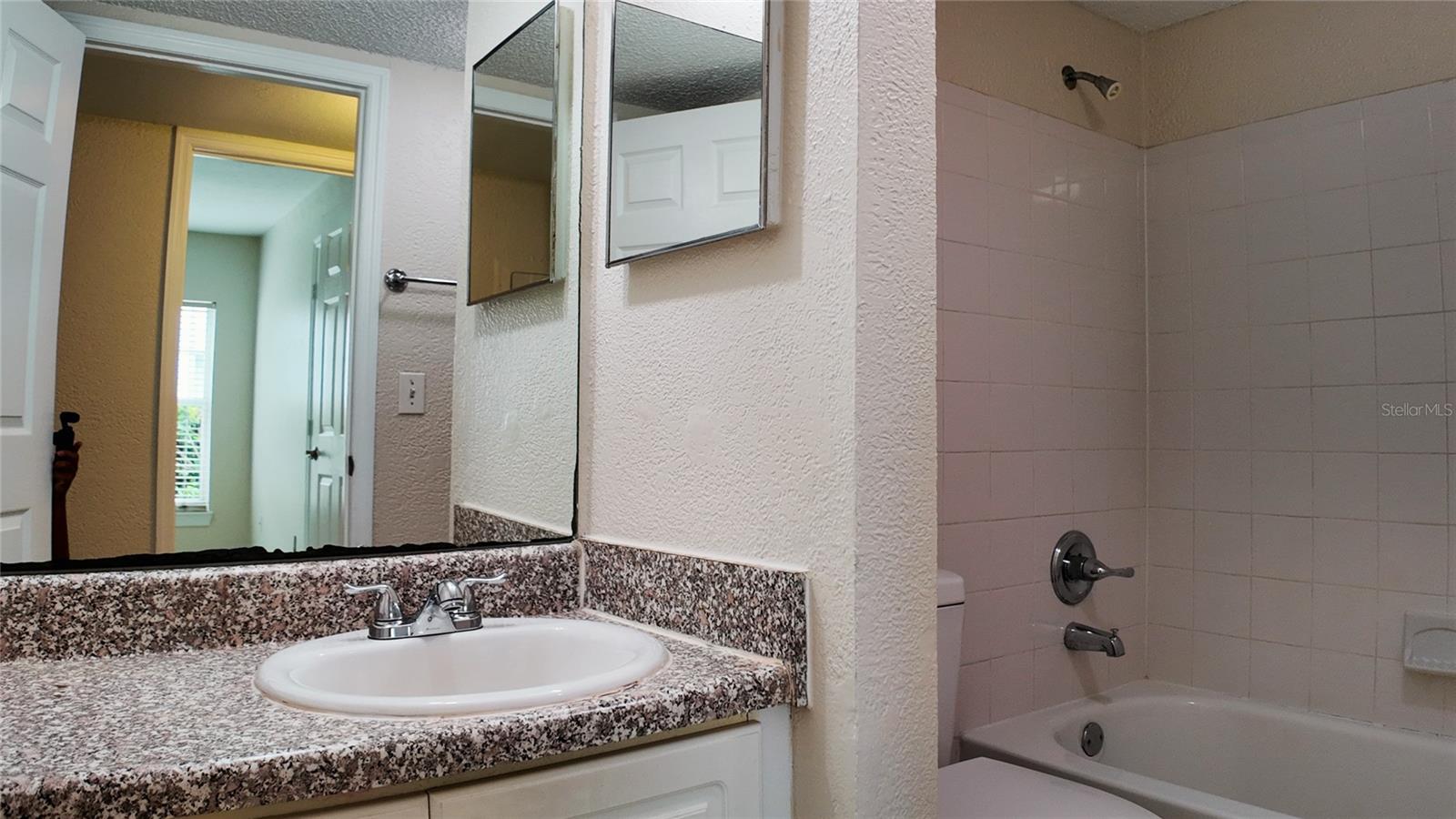 8512 OLEANDER FLOWER LN #101C — photo 14