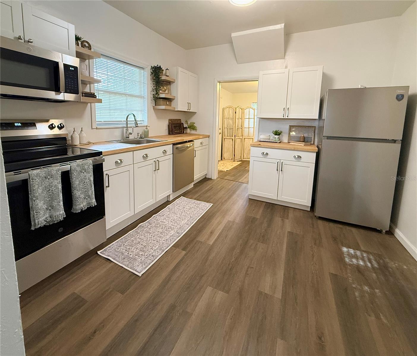 1210 E 32ND AVE — photo 3