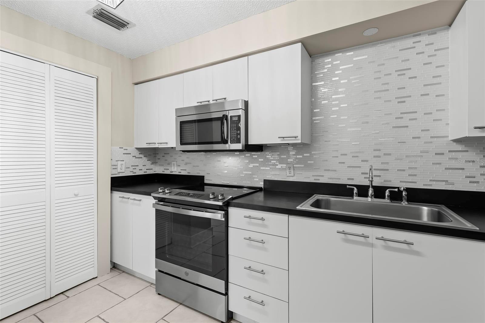 701 MIRROR LAKE DR N #201 — photo 14