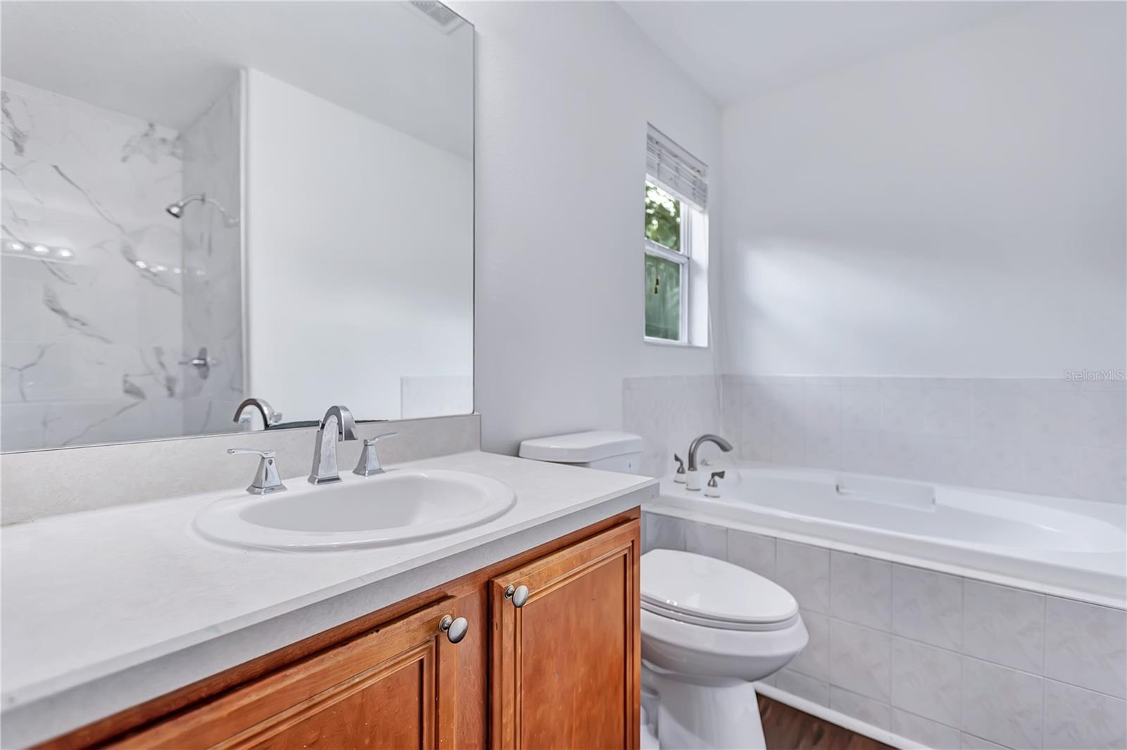 7415 OXFORD GARDEN CIR — photo 25