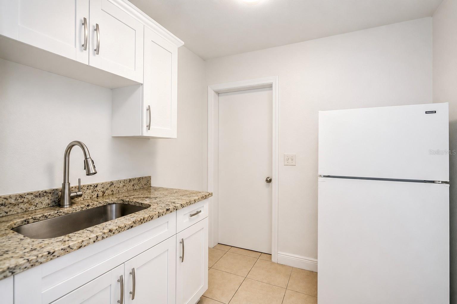 4409 W HANNA AVE — photo 25